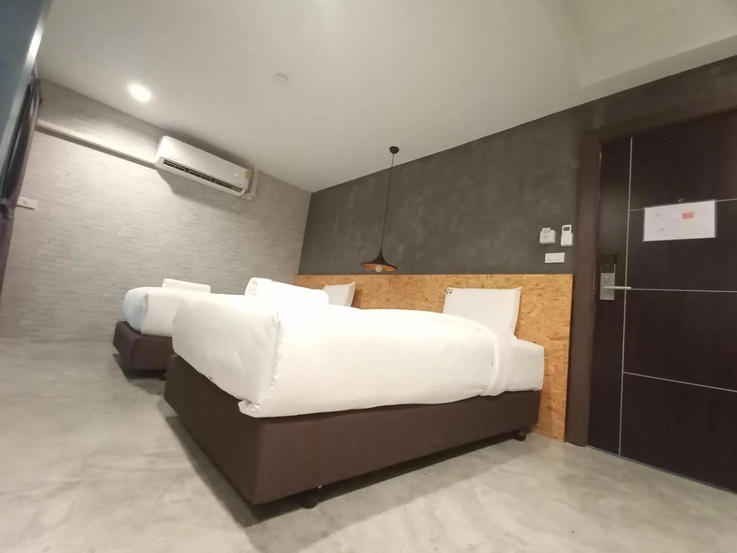 Bed in Modern Budget Hotel