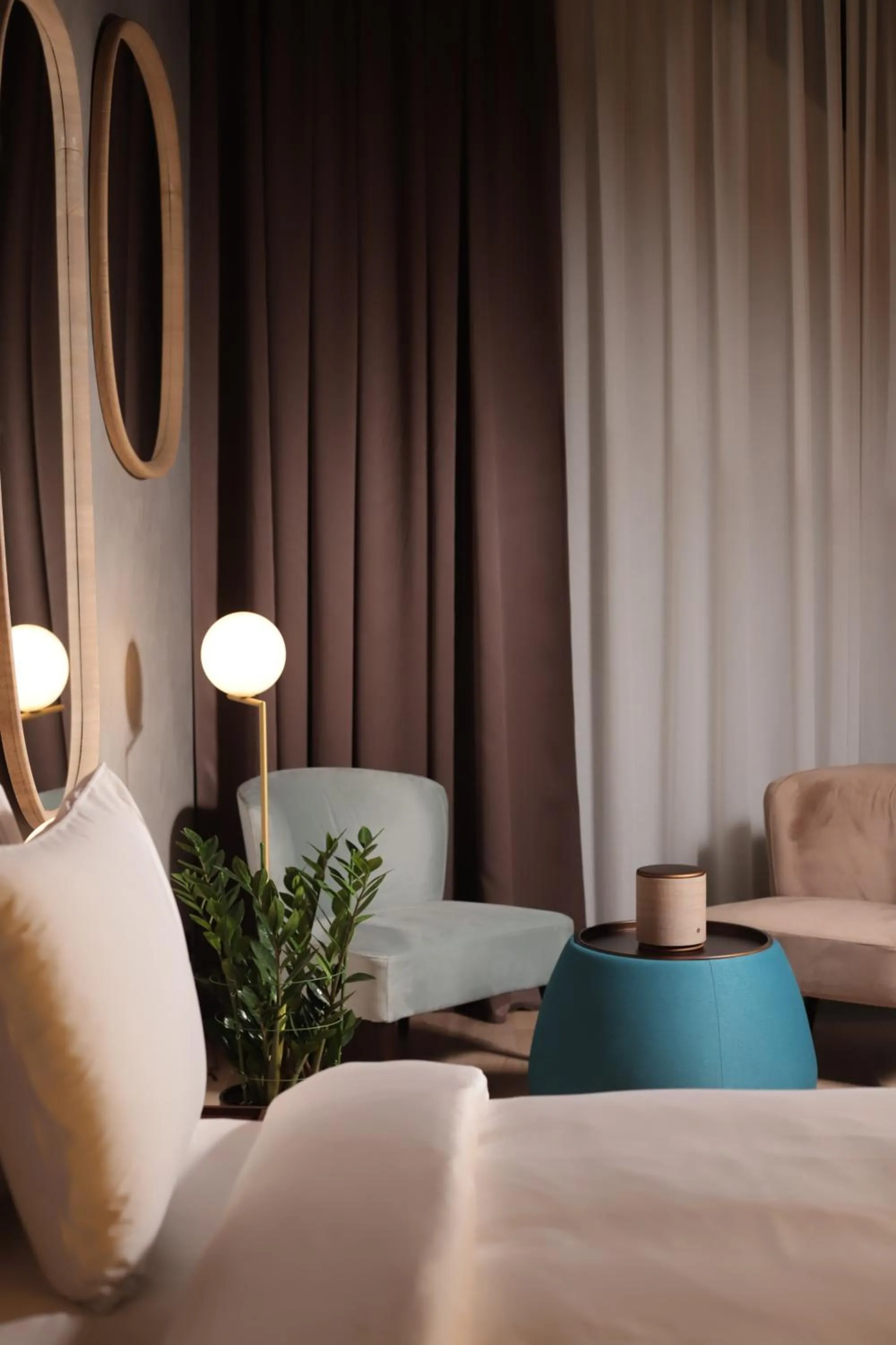 Seating area, Bed in The Veil Hotel