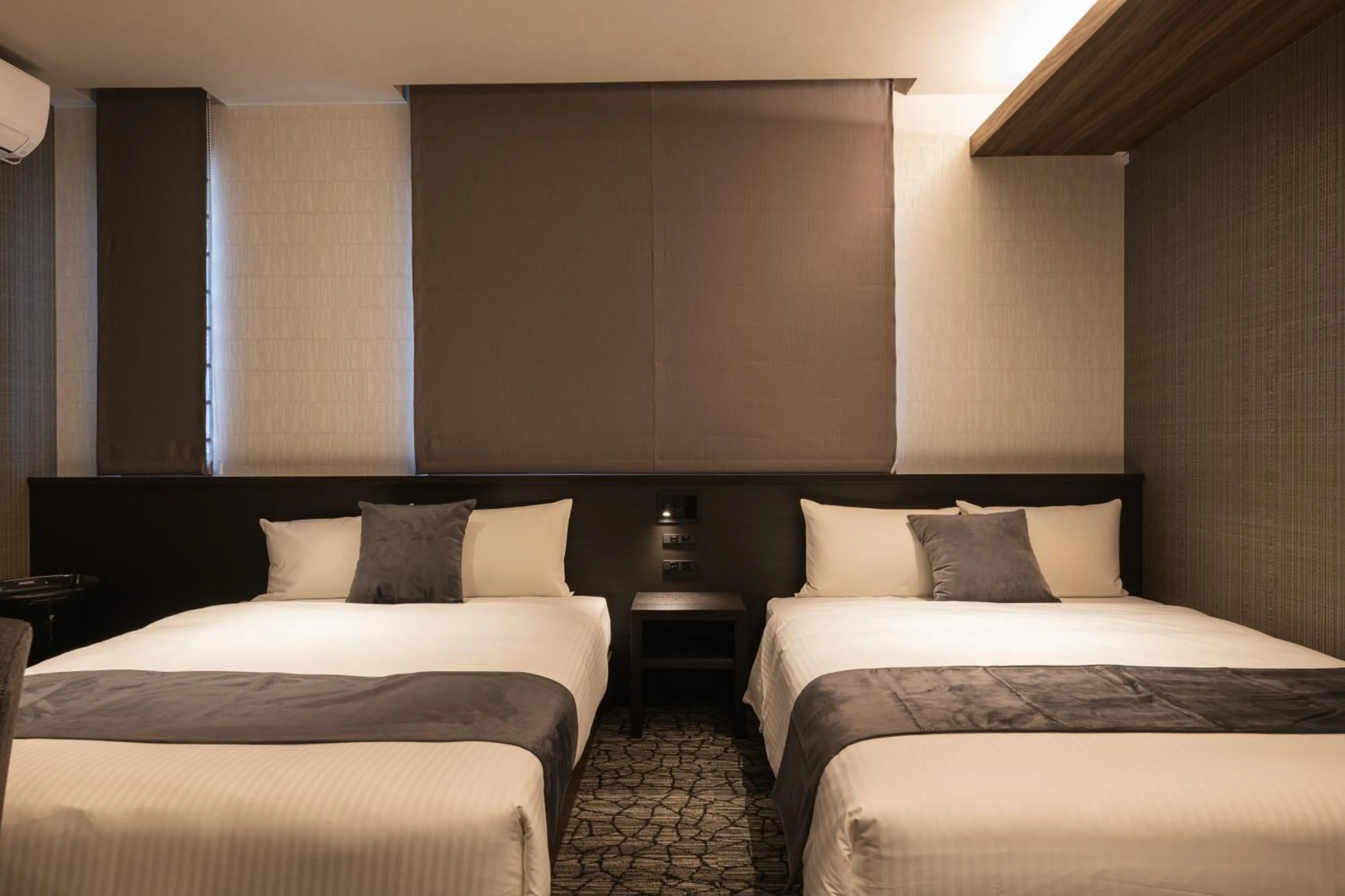 Bed in GRAND BASE Kagoshima