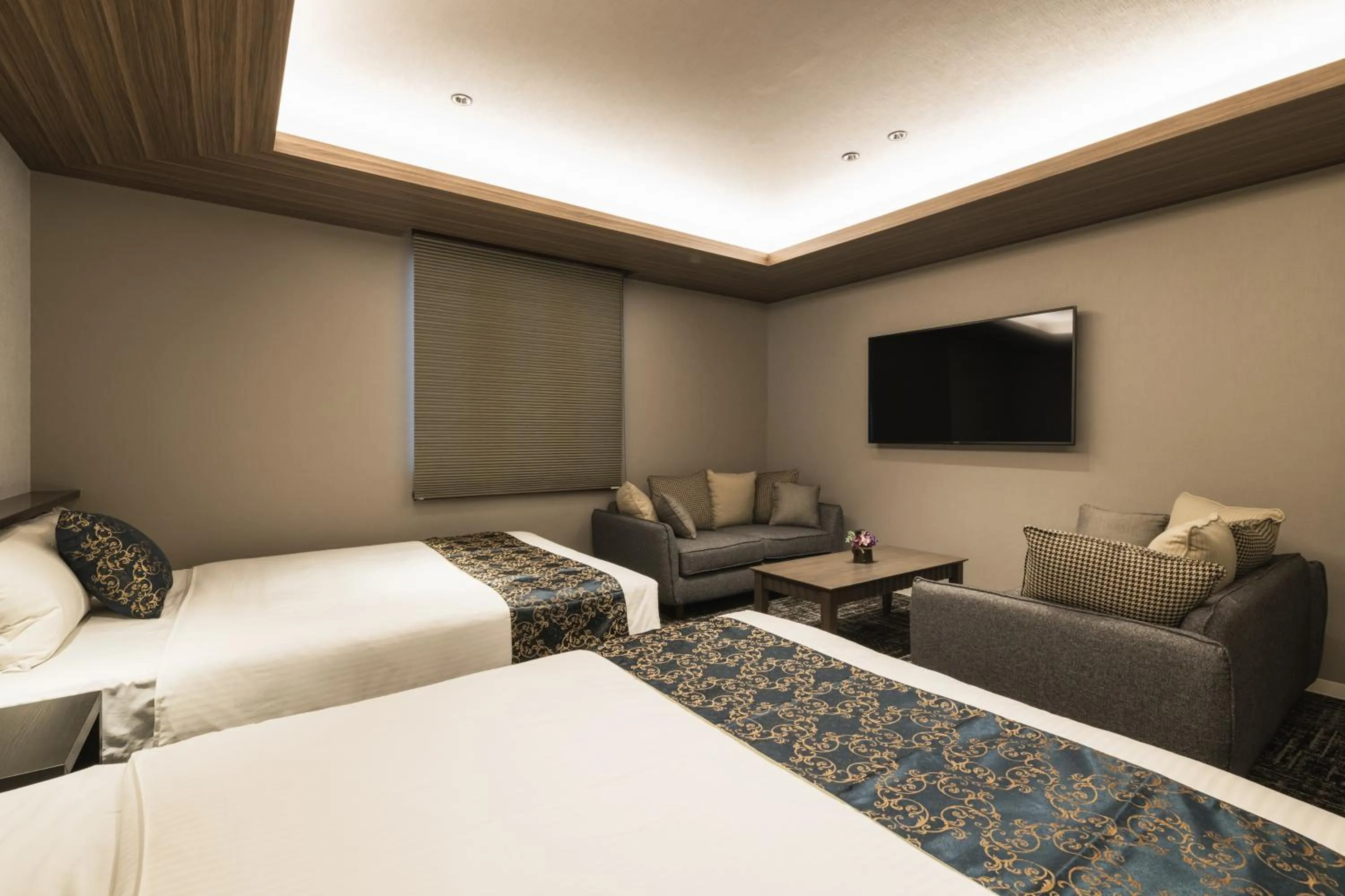 Bed in GRAND BASE Kagoshima Tenmonkan