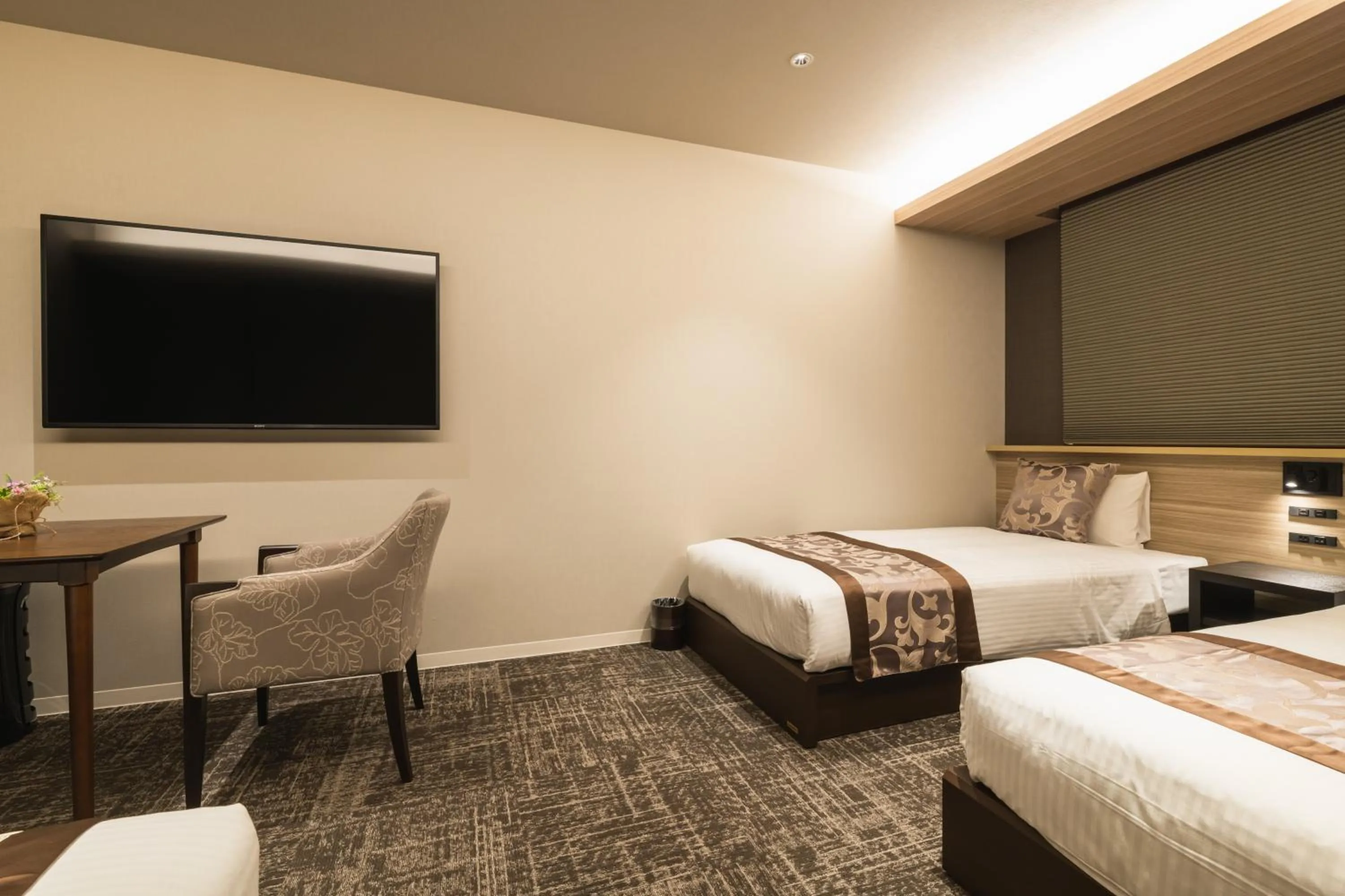 Bed in GRAND BASE Kagoshima Tenmonkan