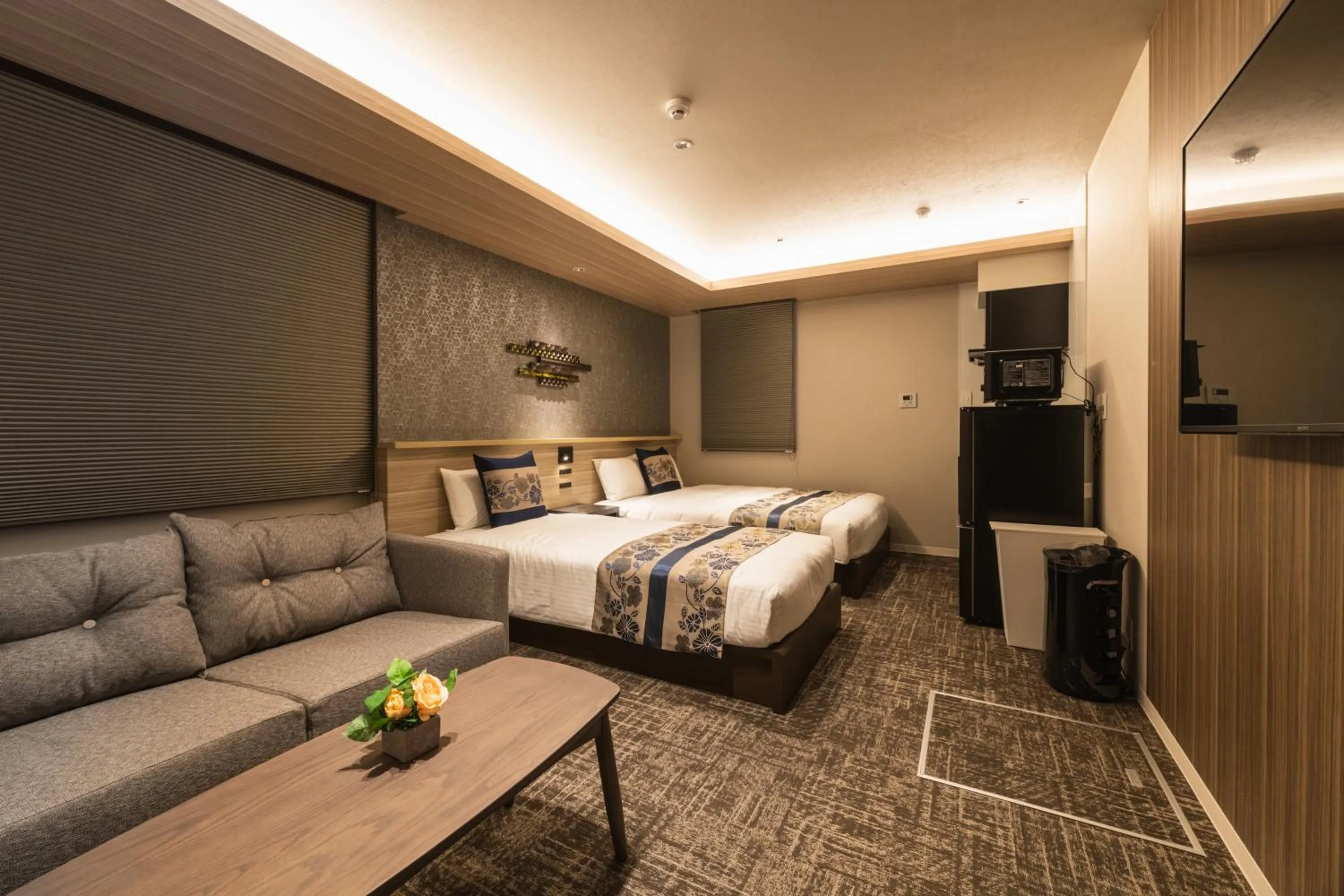 Bed in GRAND BASE Kagoshima Tenmonkan