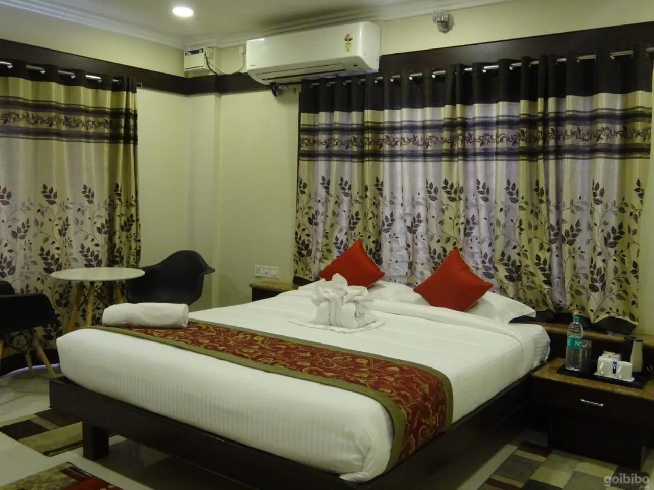 Bed in Hotel Rose Mansion Manyata Tech Park