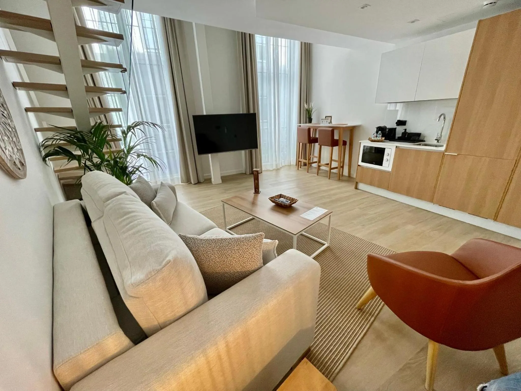 Living room in Hotel Emblemático Hi Suites