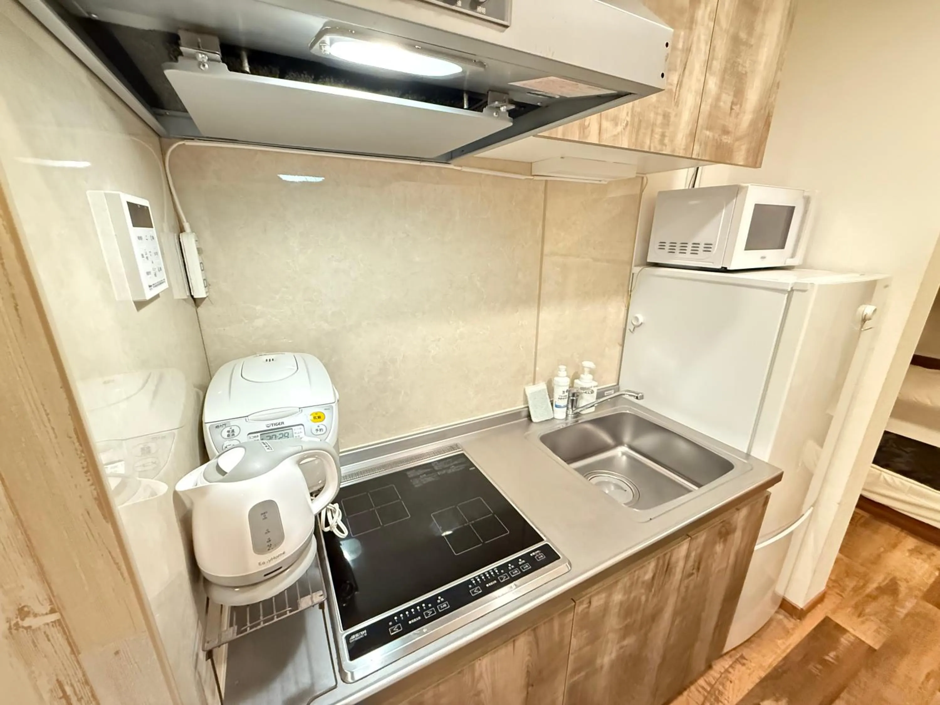 Kitchen or kitchenette in Eternity APARTMENT HOTEL SHINAGAWA