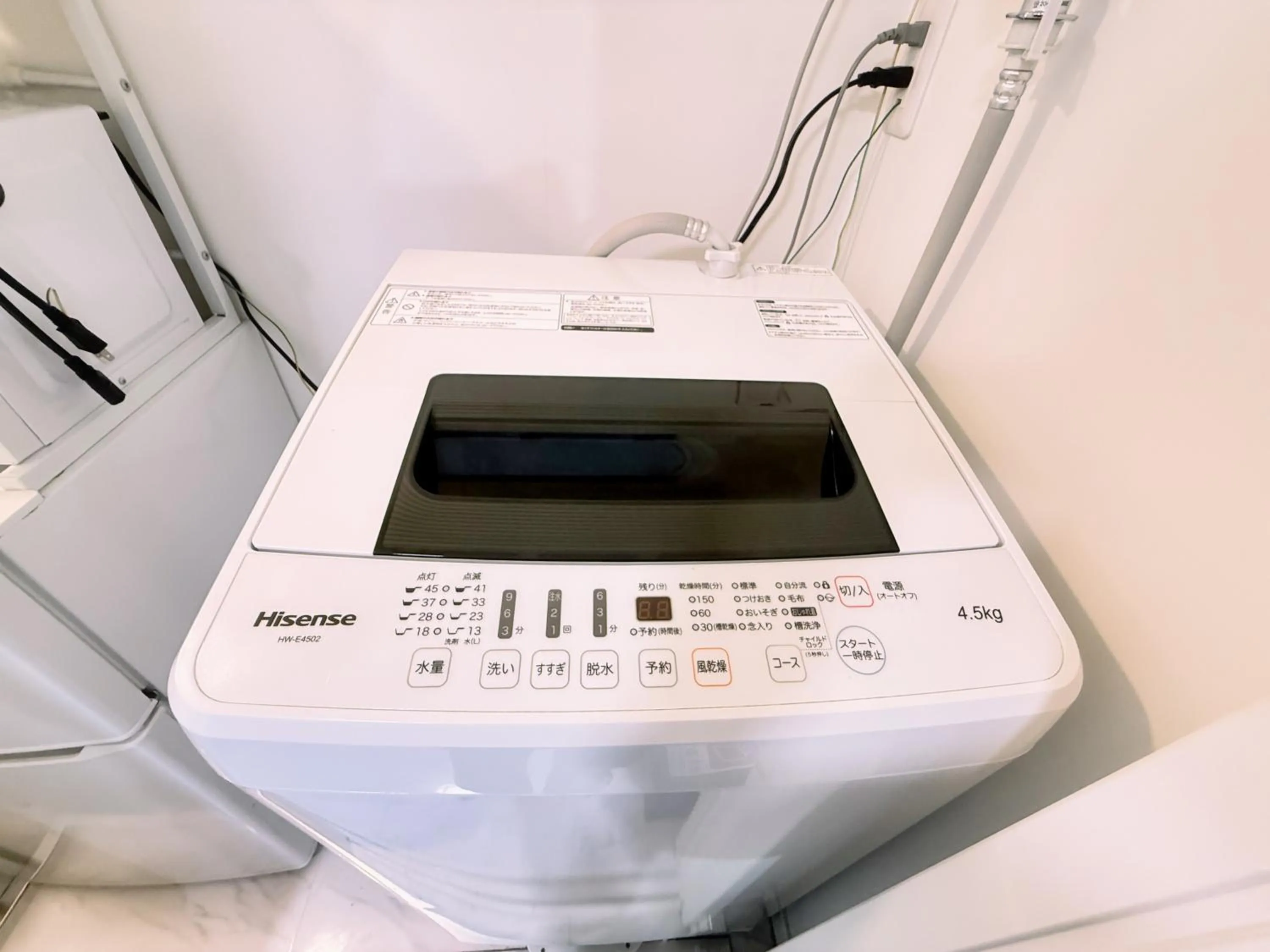 washing machine in Eternity APARTMENT HOTEL SHINAGAWA