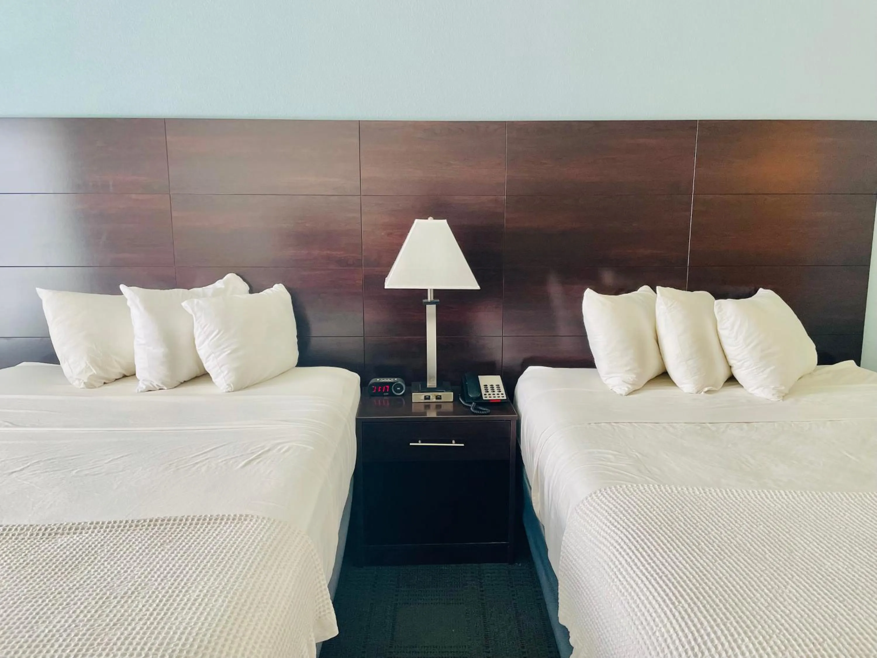 View (from property/room), Bed in FairBridge Inn & Suites Cuero