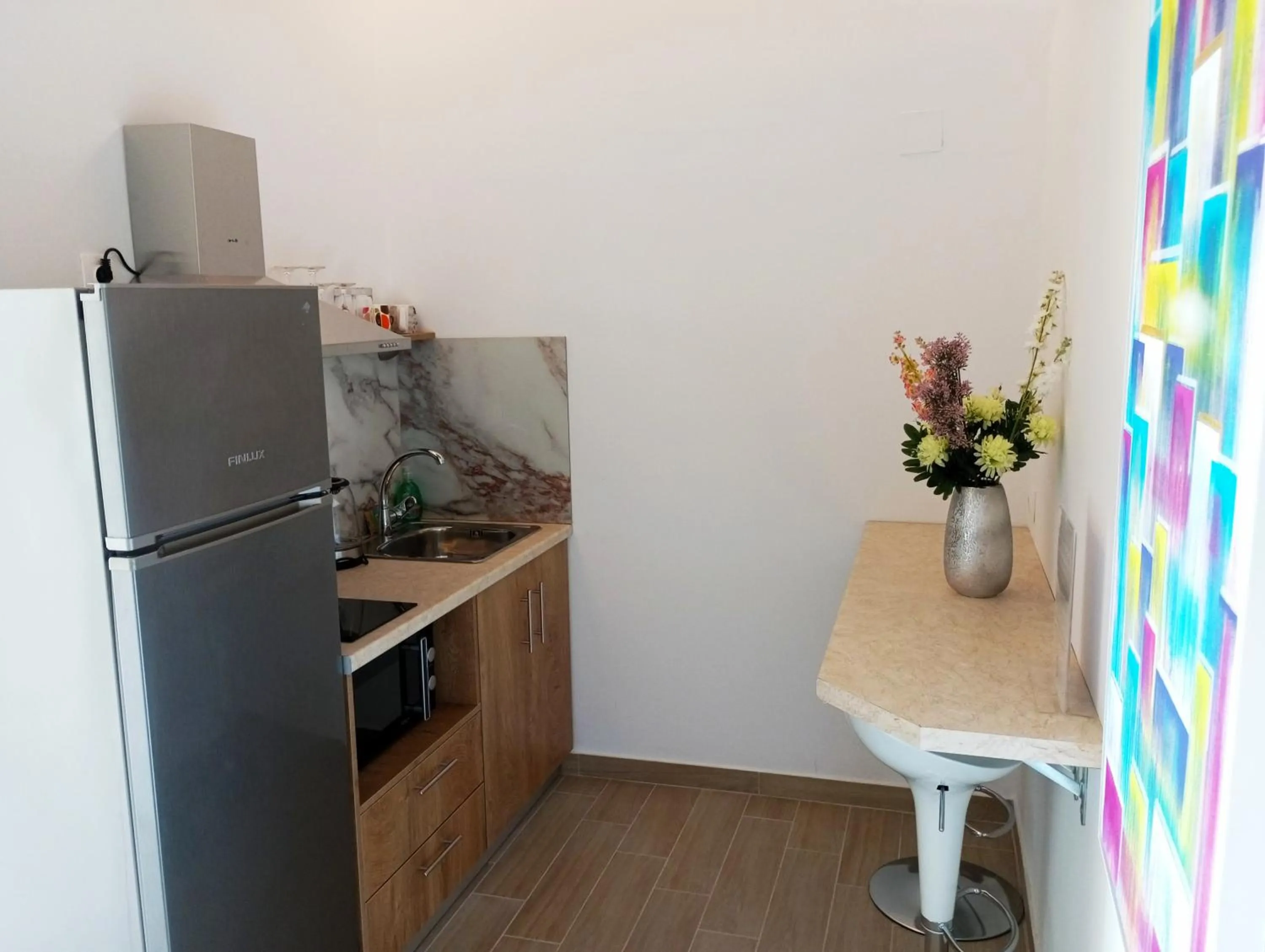 Kitchen or kitchenette in Zeus Throne Suites