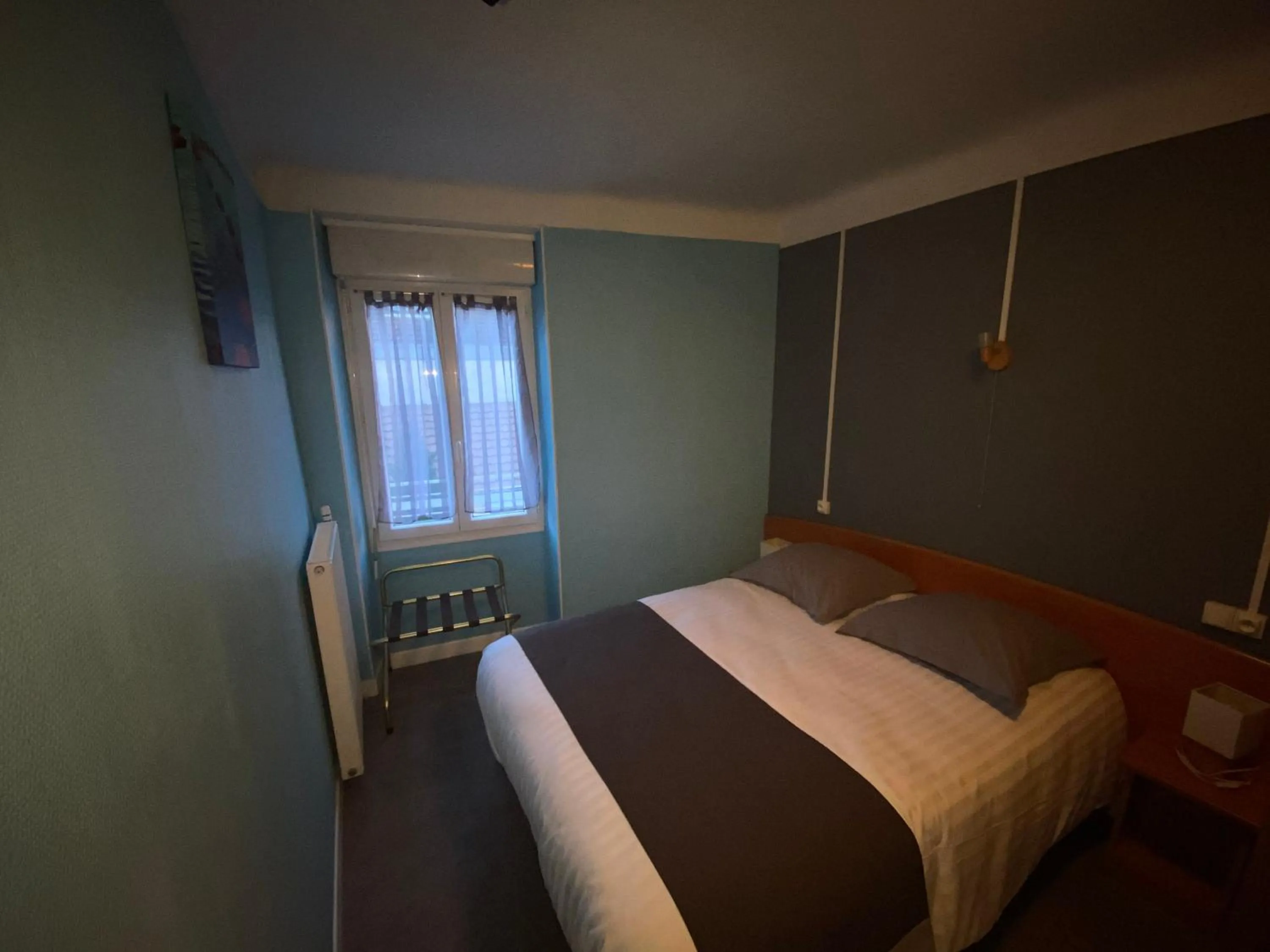 Photo of the whole room, Bed in Hôtel Thermidor