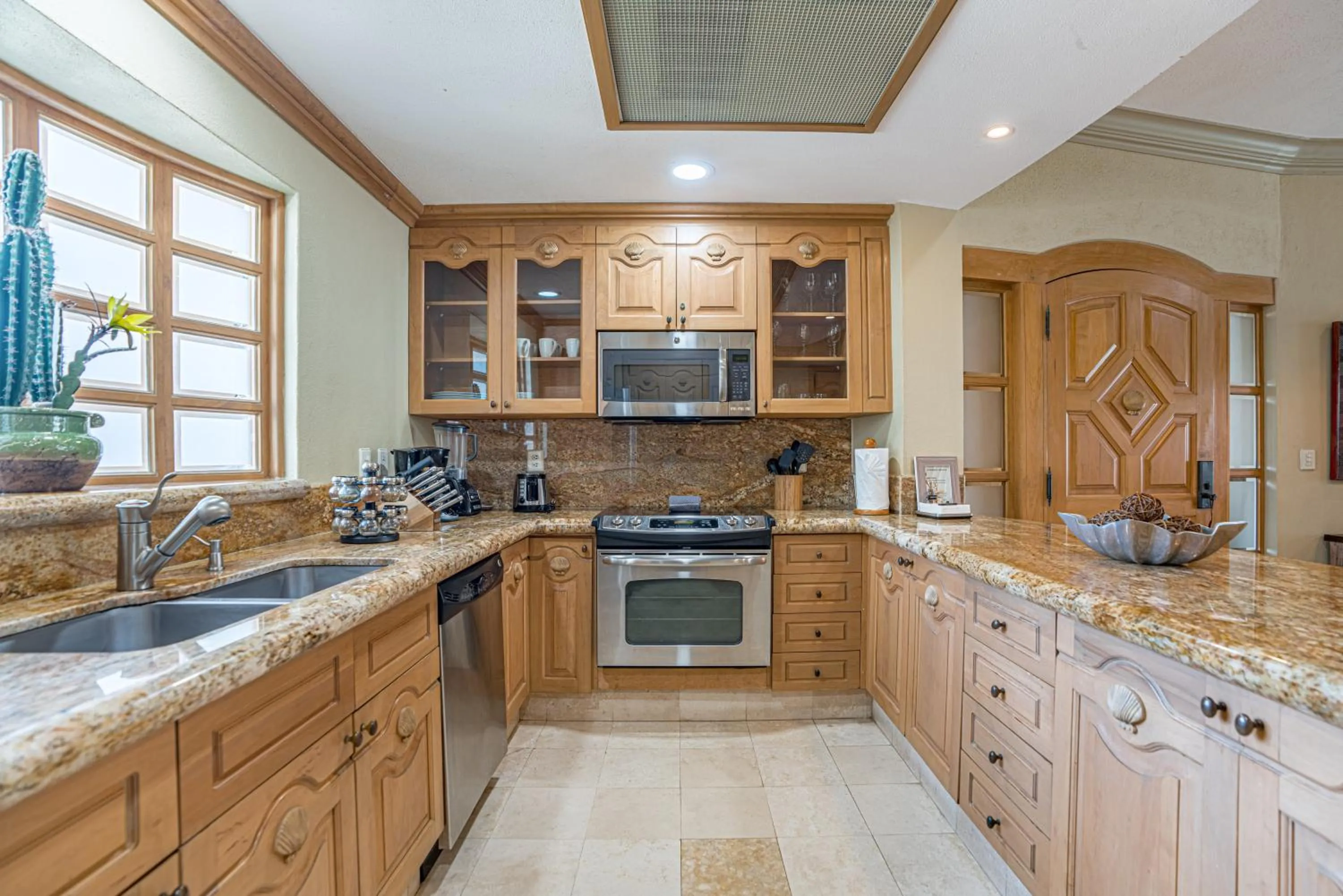 Kitchen or kitchenette in Villa La Estancia - Medano Beach Villas