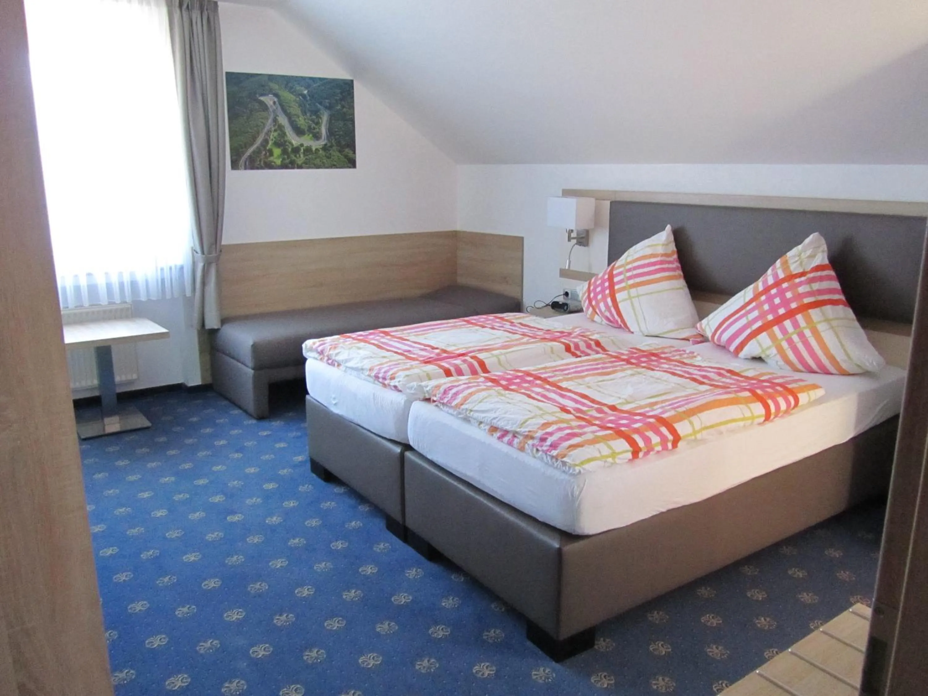 Photo of the whole room, Bed in Hotel zur Burg Nürburg