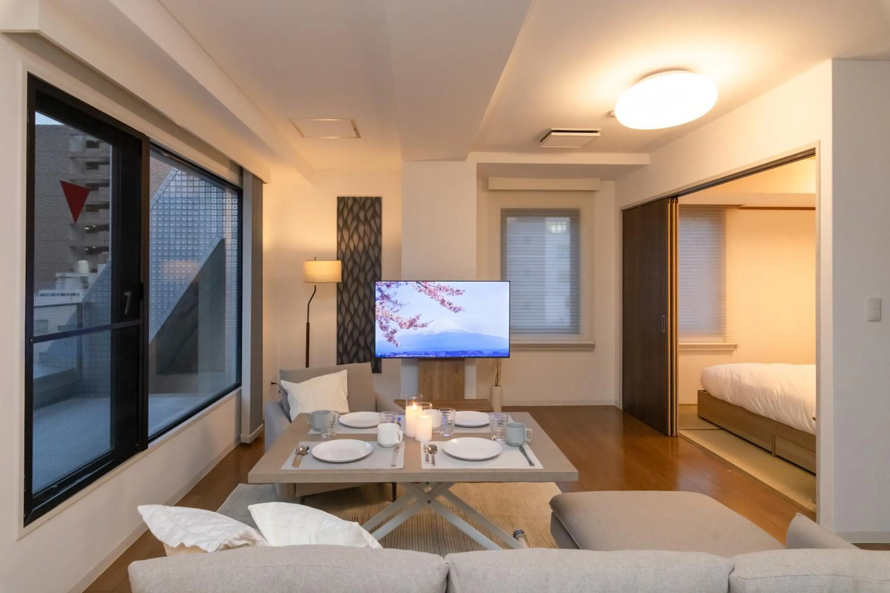 Living room, Bed in Atrium Deluxe Apartments Osaka - Self Check-In Only