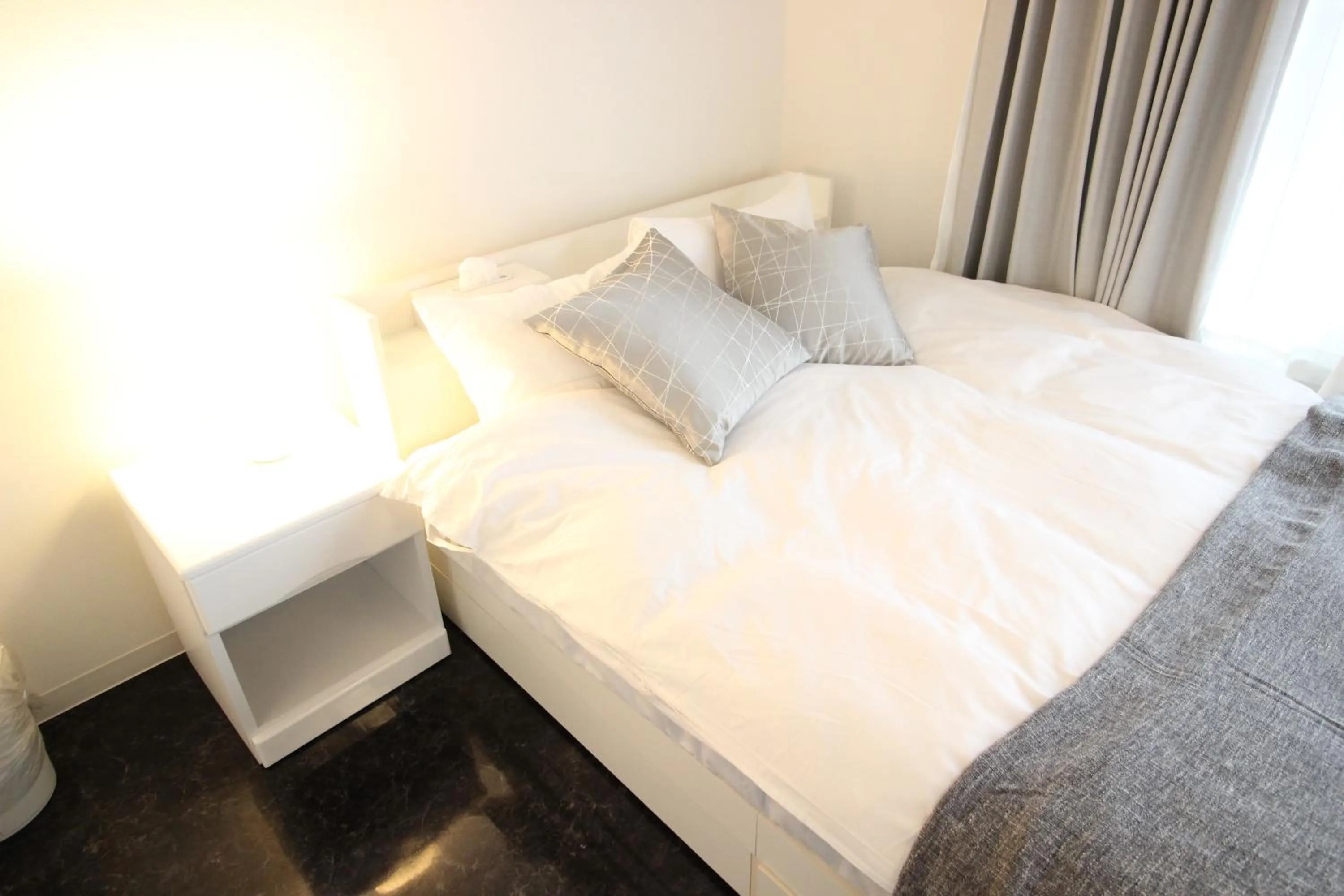 Bedroom, Bed in Atrium Deluxe Apartments Osaka - Self Check-In Only
