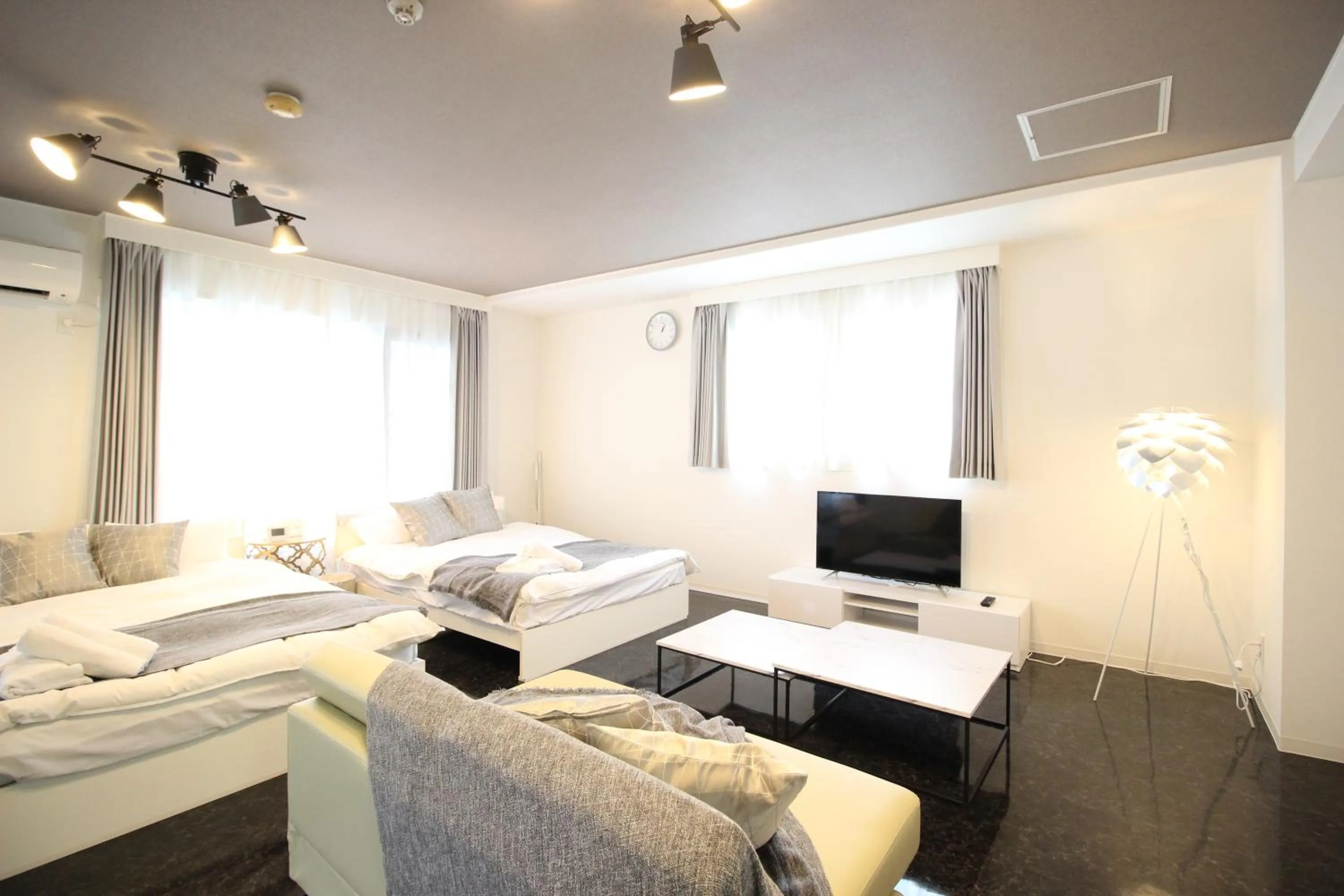 Living room, Bed in Atrium Deluxe Apartments Osaka - Self Check-In Only