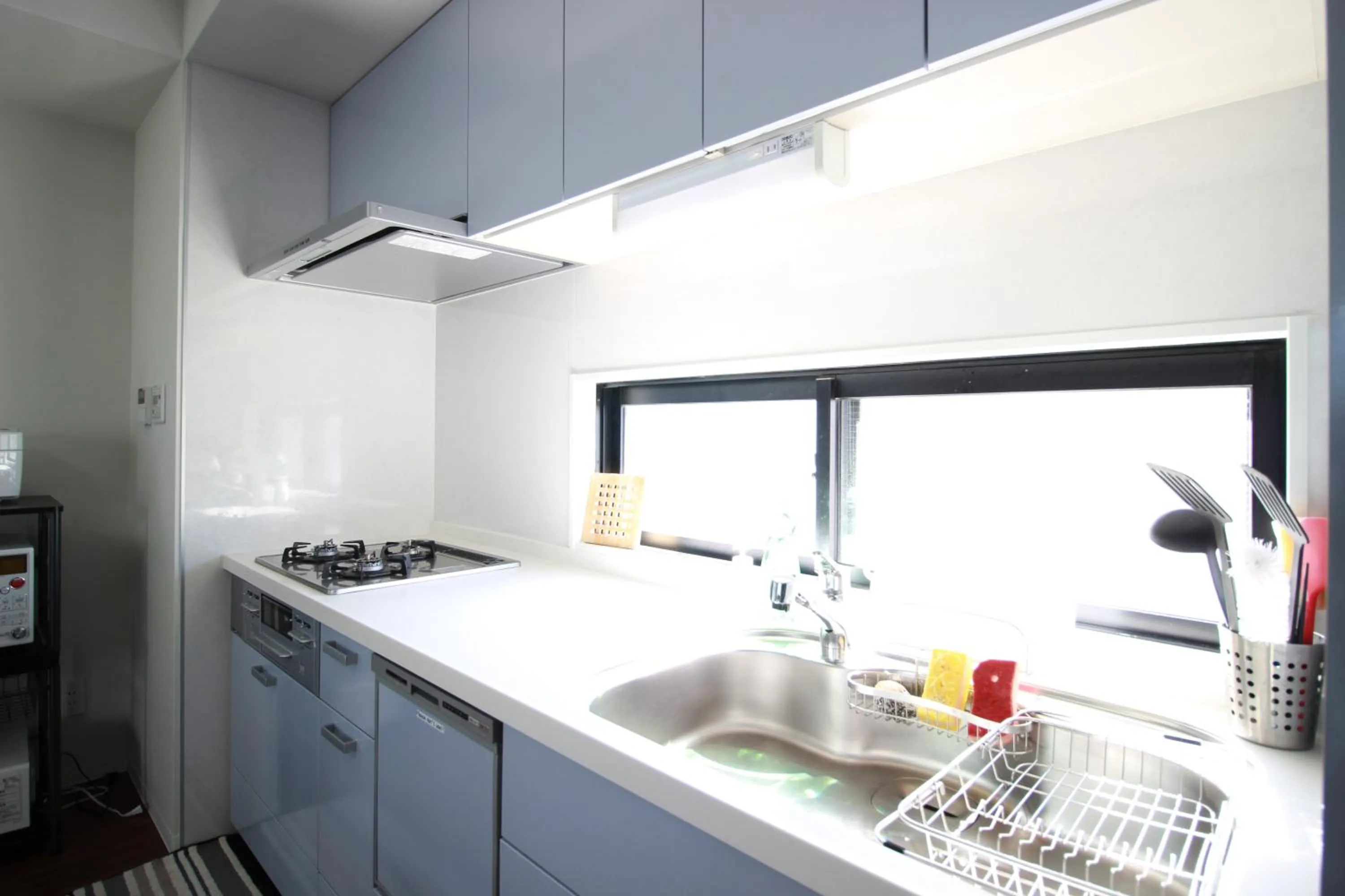 Kitchen or kitchenette in Atrium Deluxe Apartments Osaka - Self Check-In Only