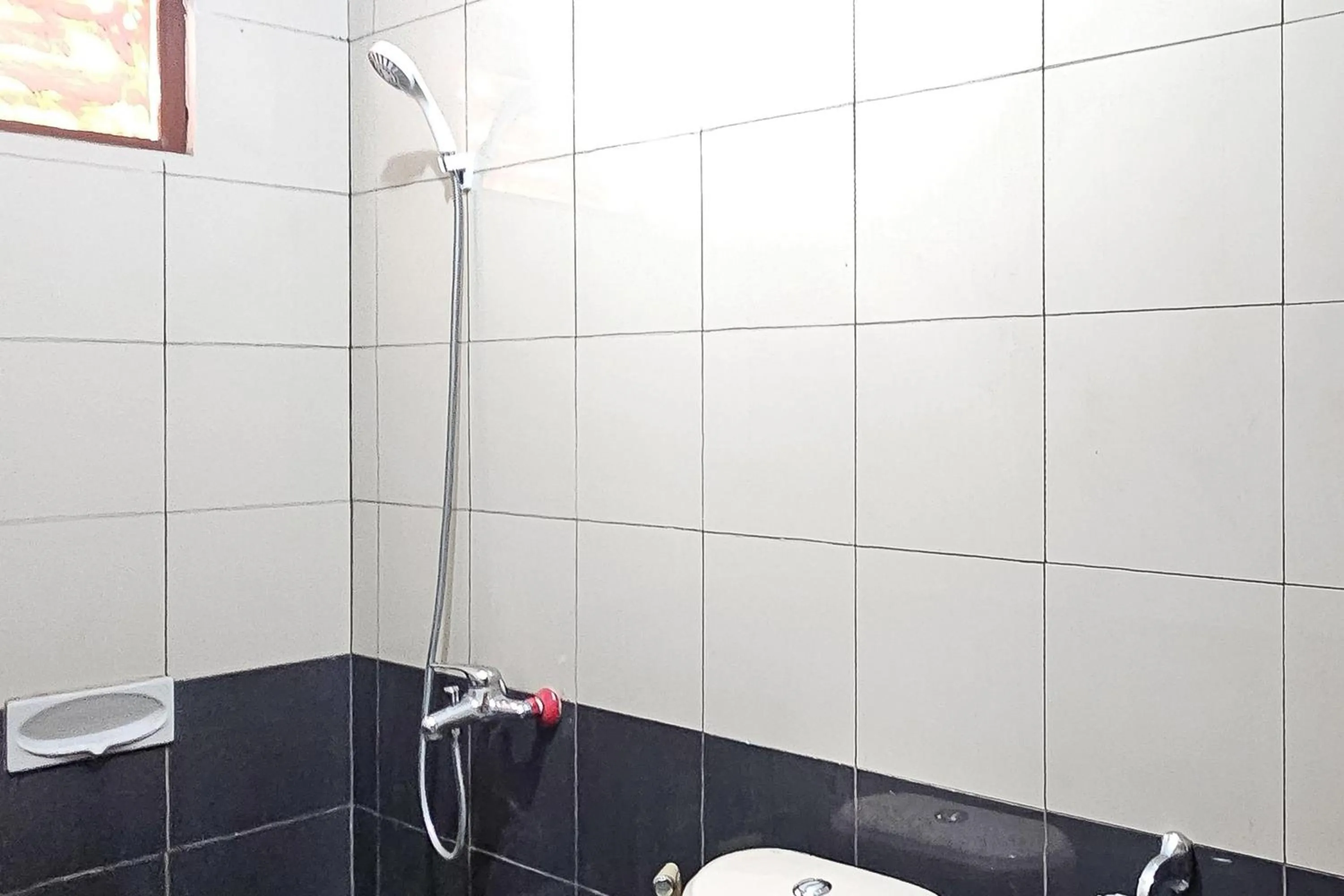 Bathroom in Urbanview My Grand Hotel Bogor