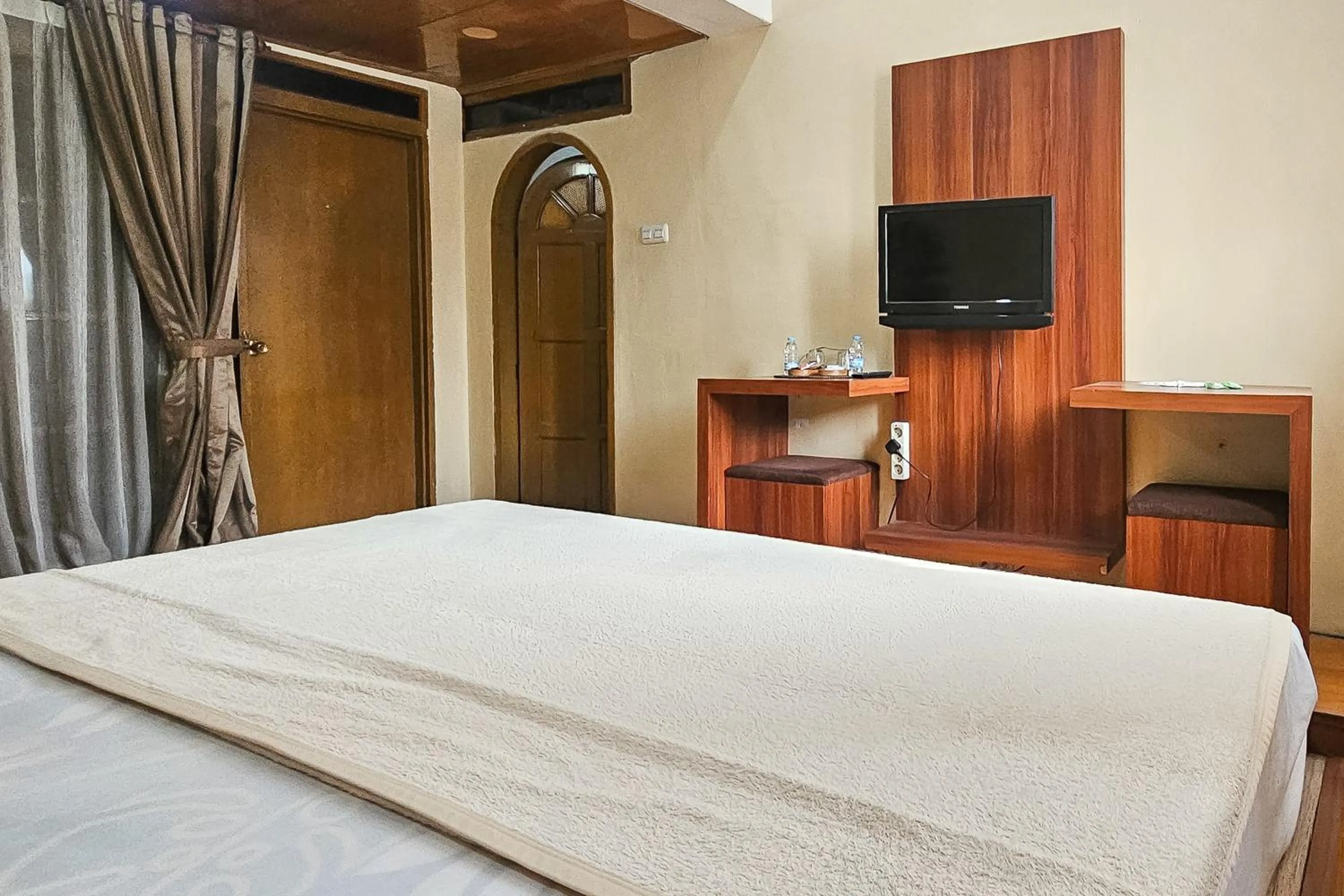 Bedroom, Bed in Urbanview My Grand Hotel Bogor