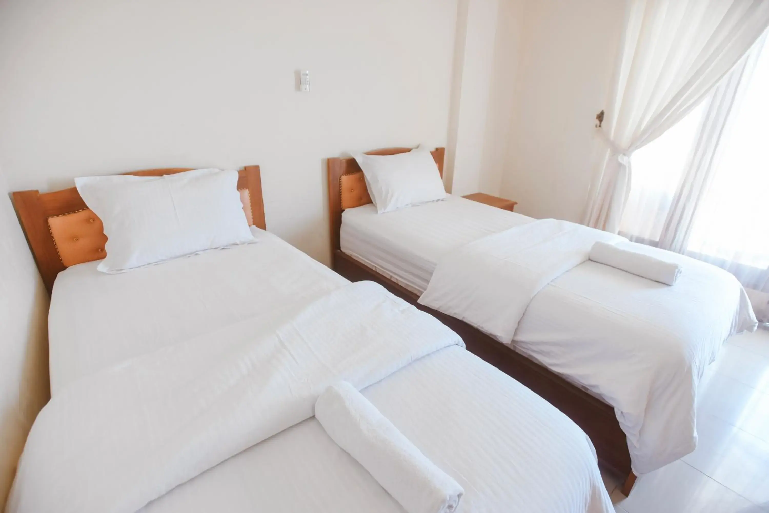 Bed in CHRYSANT HOTEL & RESORT Bed in CHRYSANT HOTEL & RESORT