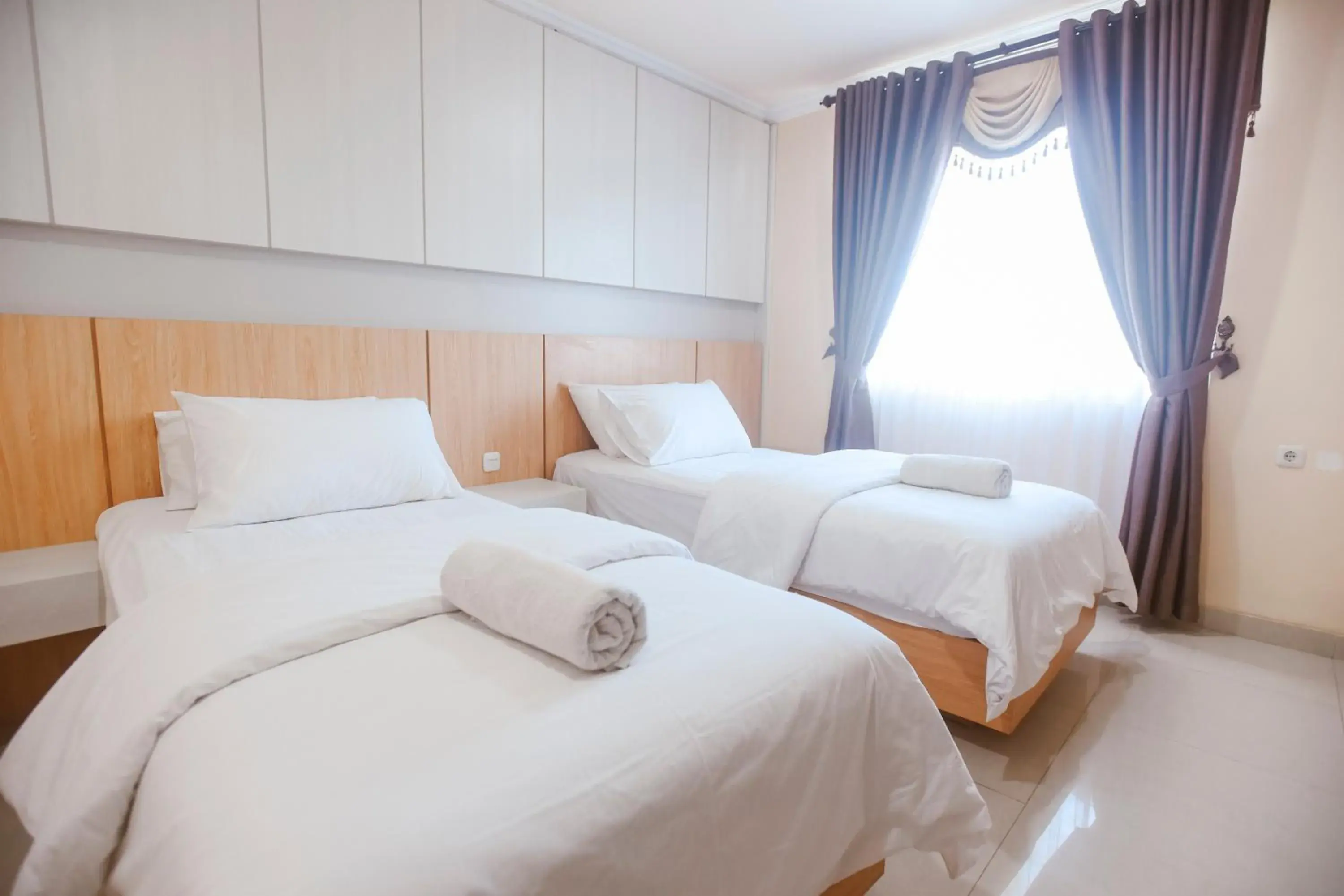 Bed in CHRYSANT HOTEL & RESORT Bed in CHRYSANT HOTEL & RESORT