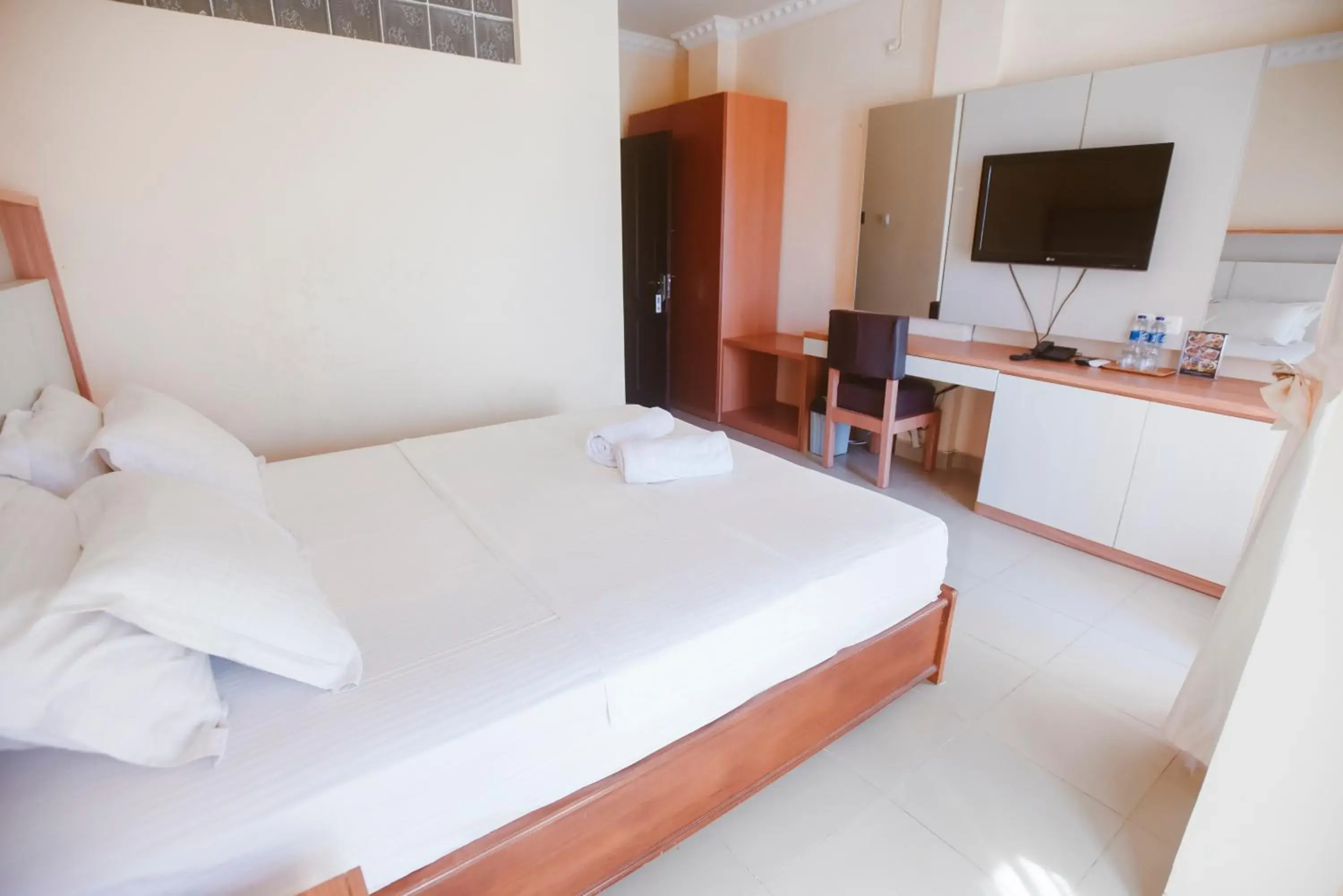 Communal lounge/ TV room, Bed in CHRYSANT HOTEL & RESORT Communal lounge/ TV room, Bed in CHRYSANT HOTEL & RESORT