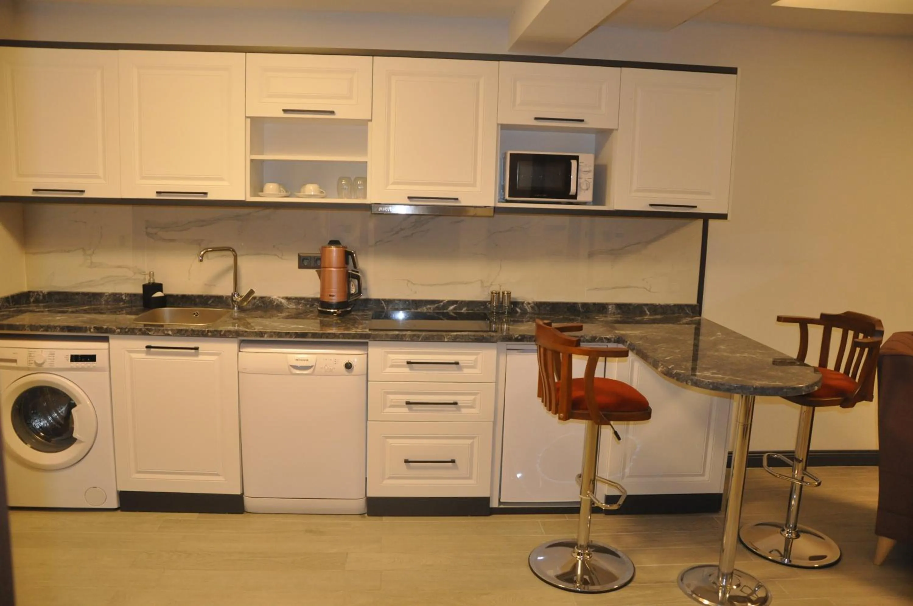 Kitchen or kitchenette in GOLAZ SUİT OTEL