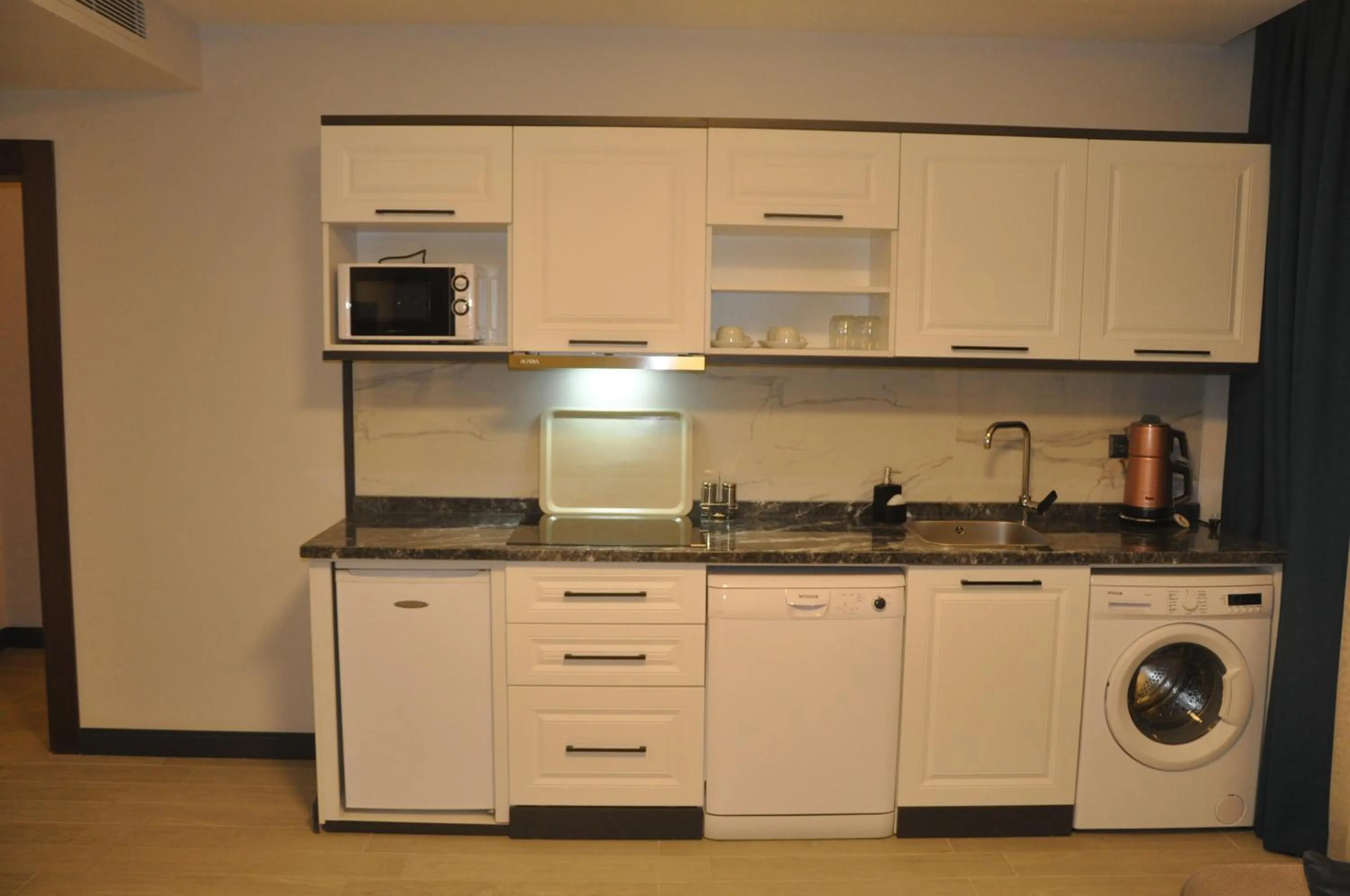 Kitchen or kitchenette in GOLAZ SUİT OTEL