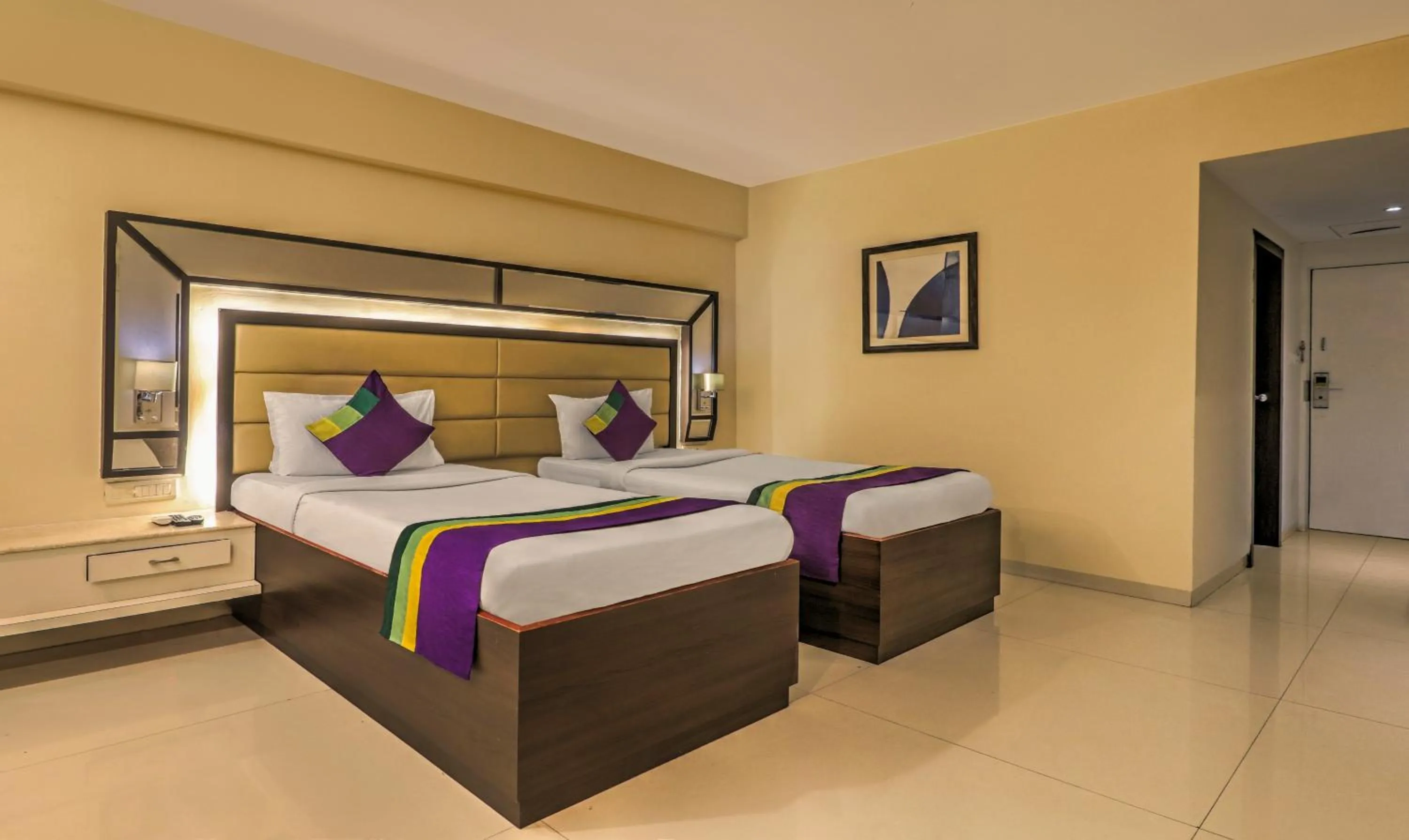 Bedroom, Bed in Treebo Premium Metropolis