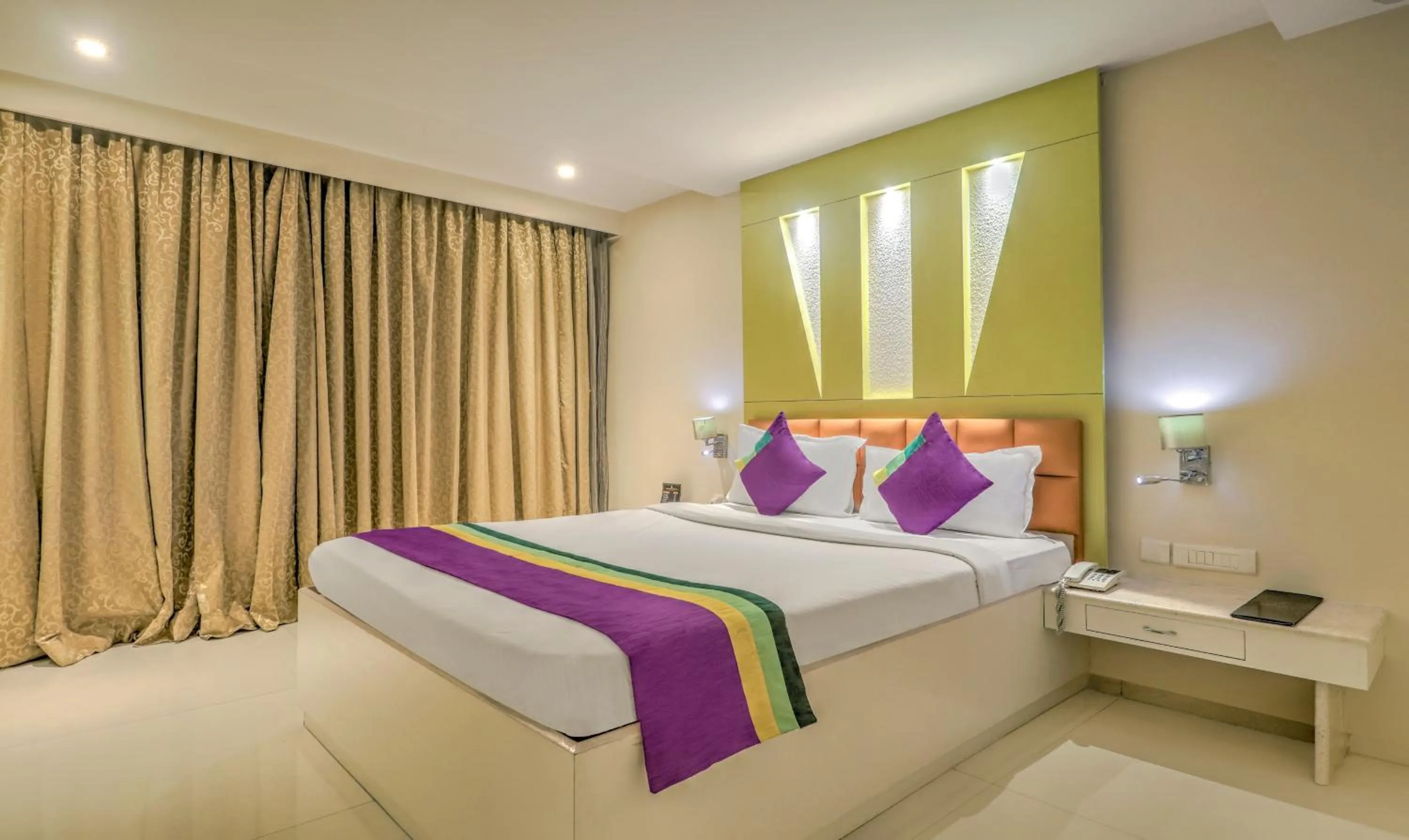 Bedroom, Bed in Treebo Premium Metropolis