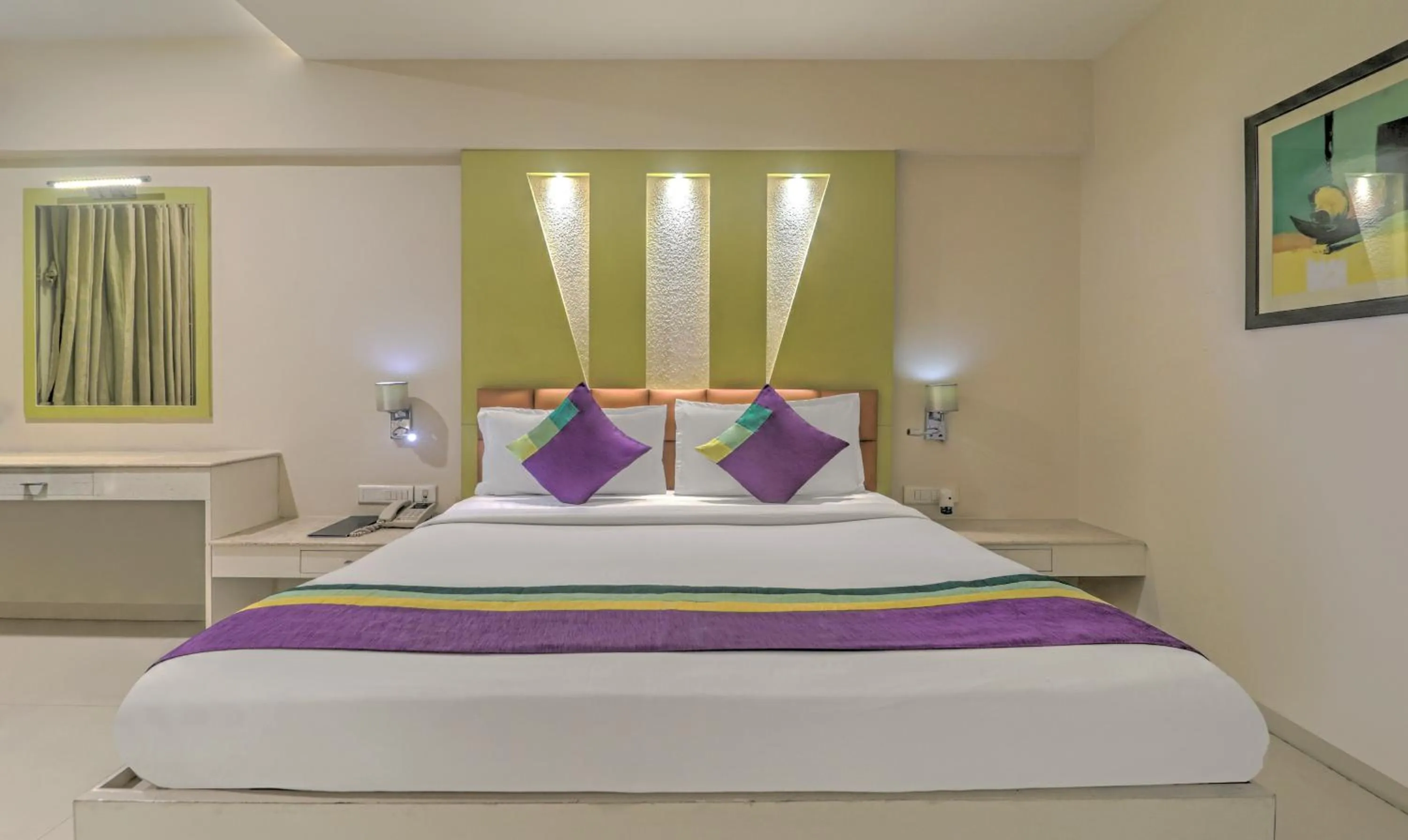 Bedroom, Bed in Treebo Premium Metropolis