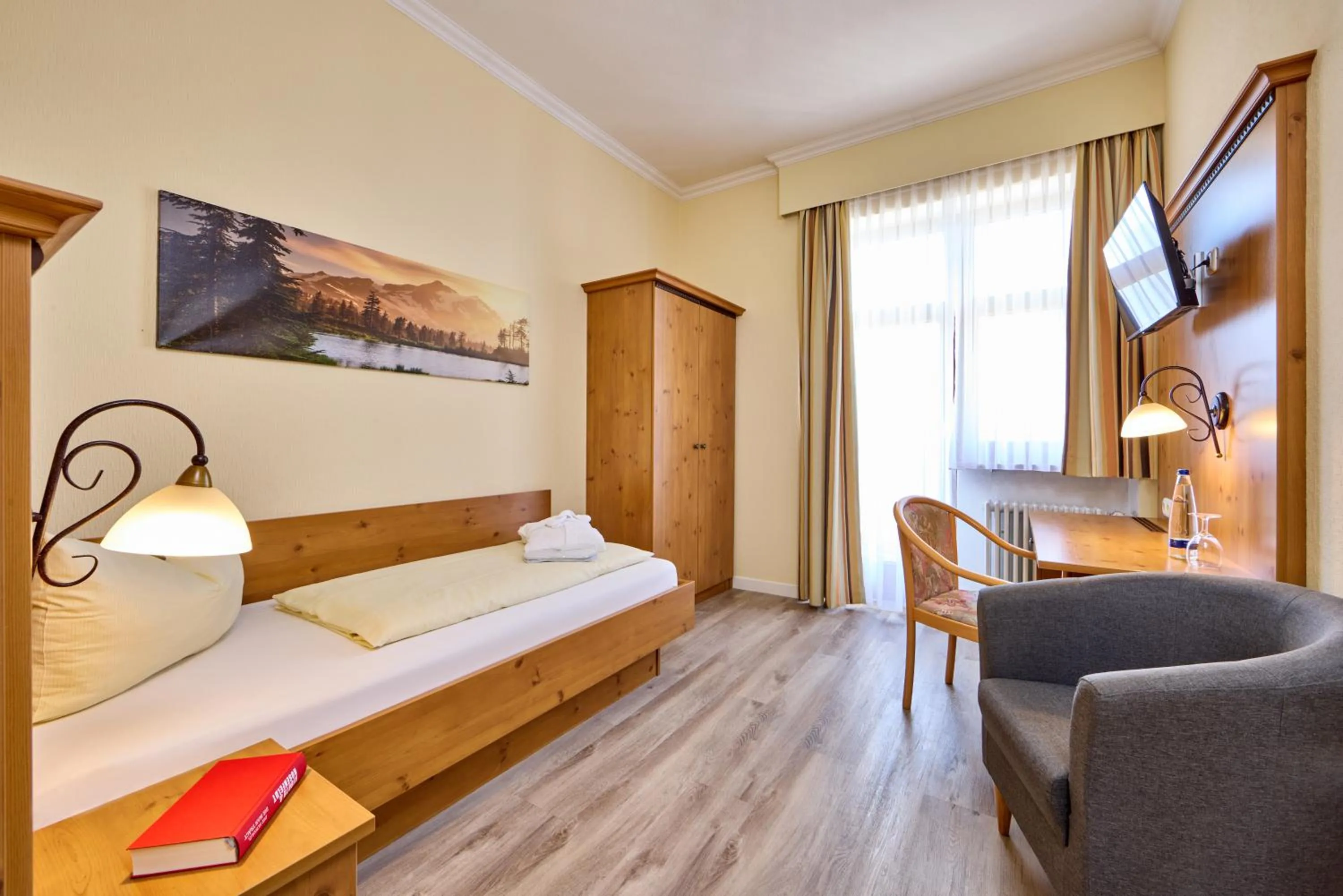 Bed in Hotel Vier Jahreszeiten