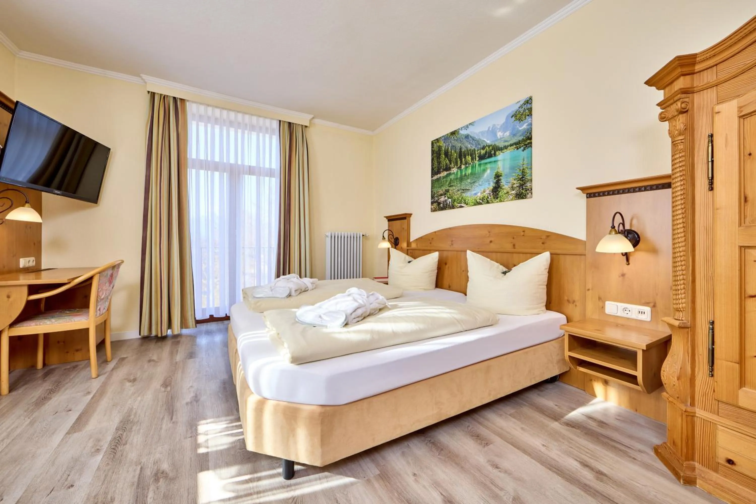 Bed in Hotel Vier Jahreszeiten