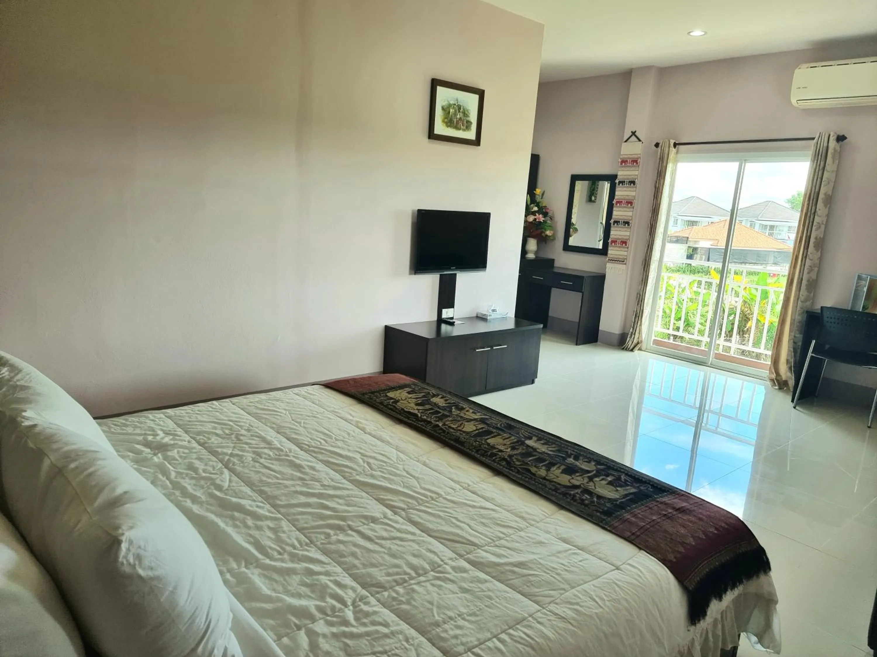 Bedroom, Bed in Chiangkham Grand Villa - SHA Certified