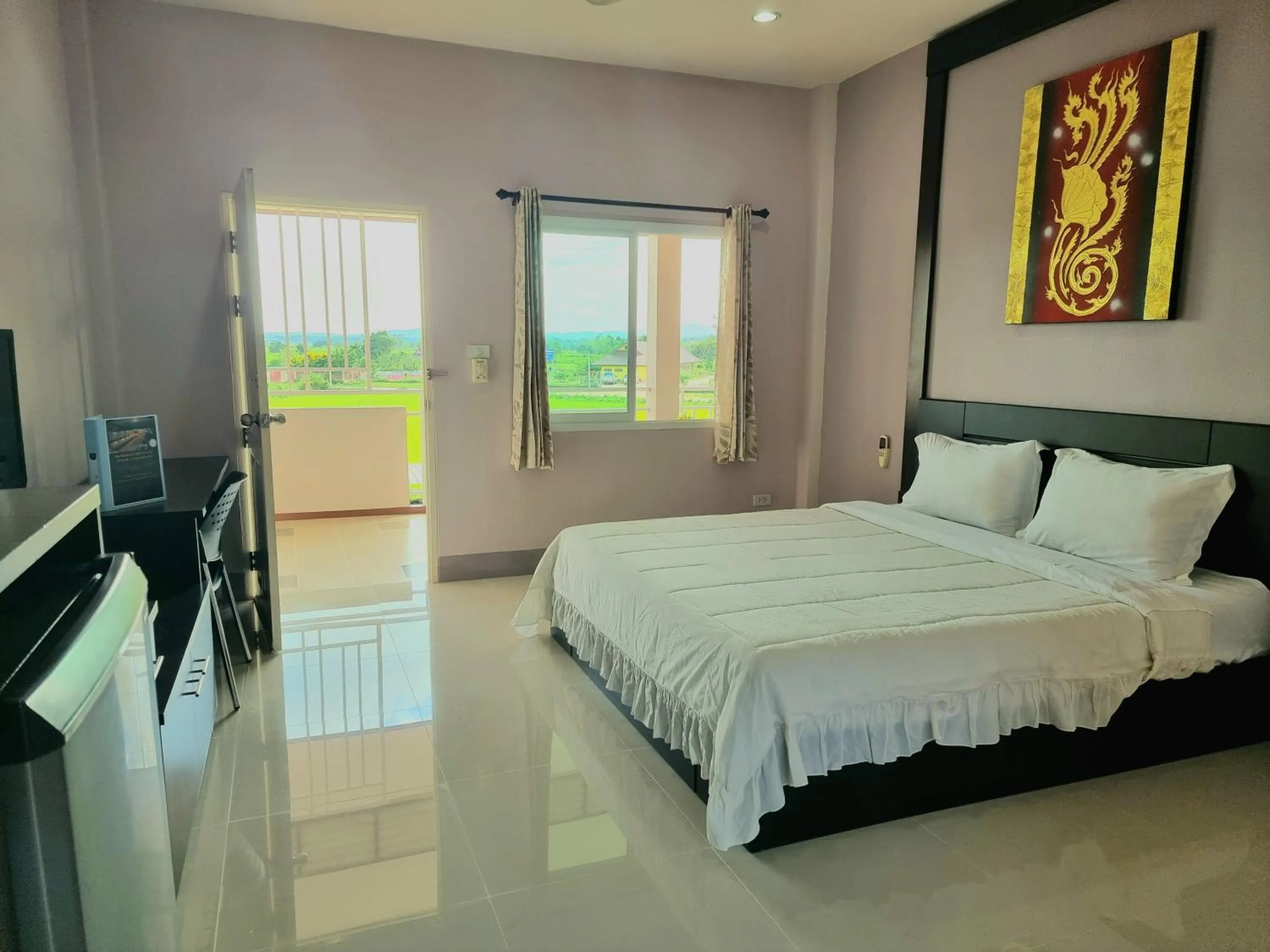 Bed in Chiangkham Grand Villa - SHA Certified