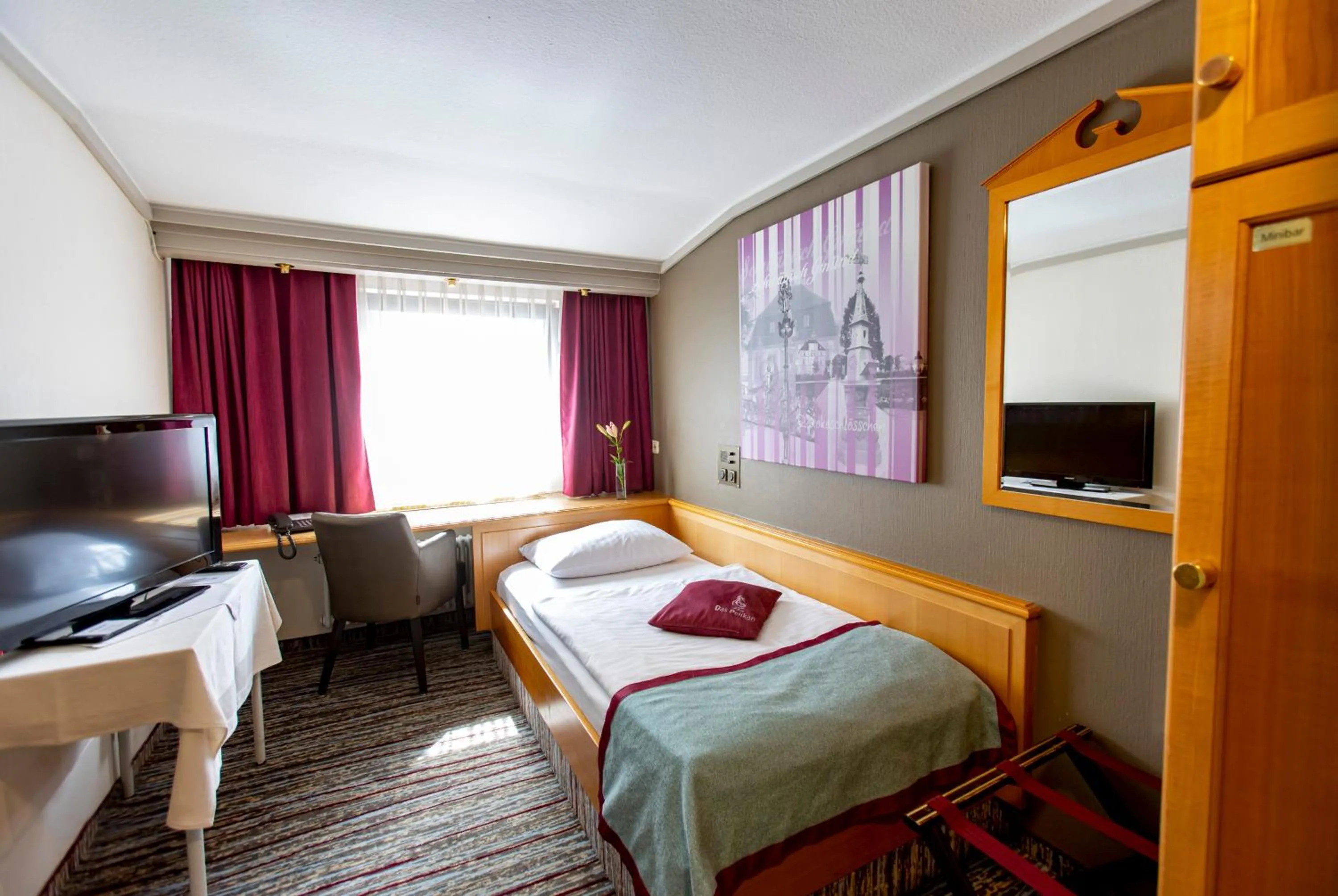 Bed in Hotel Pelikan