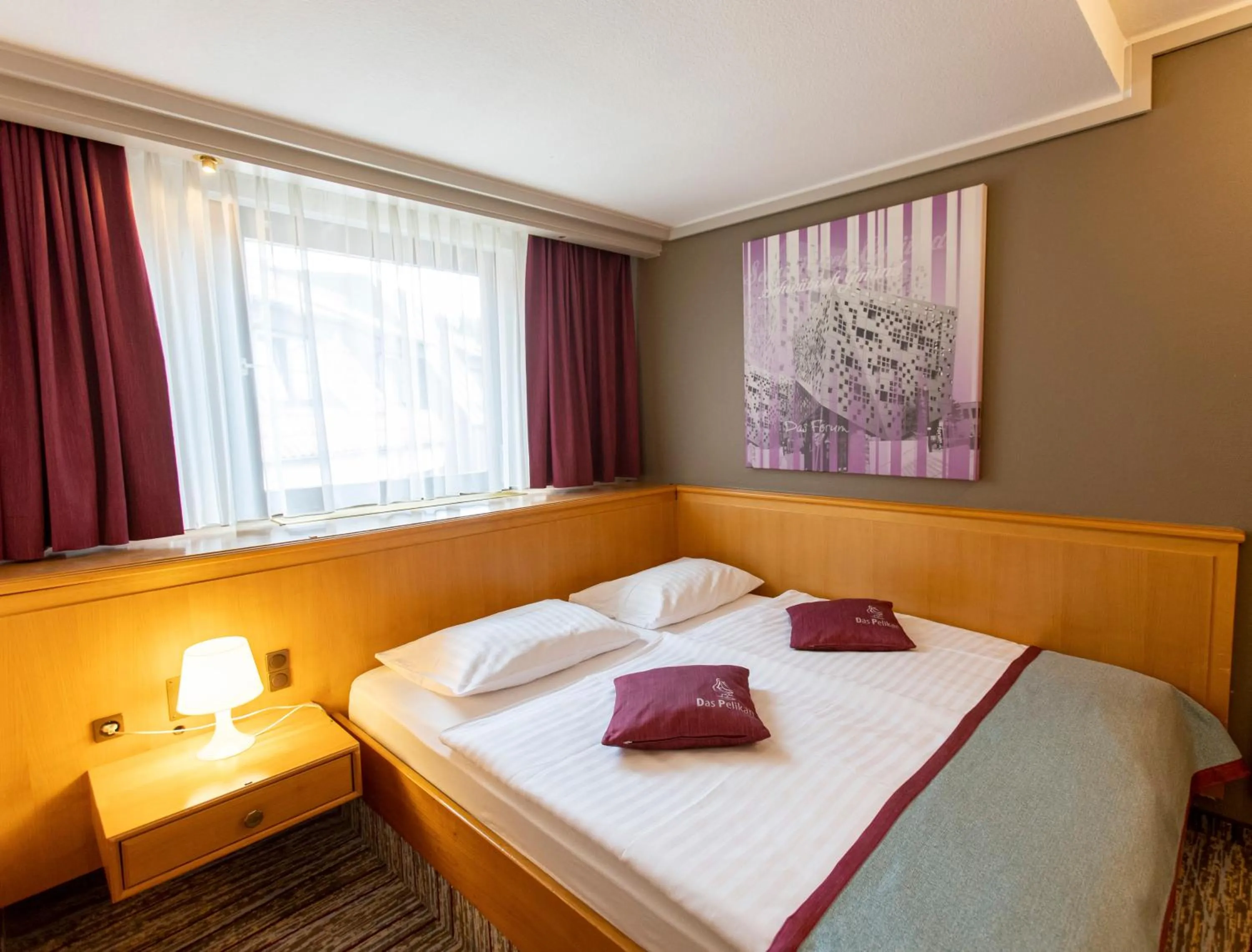 Bed in Hotel Pelikan