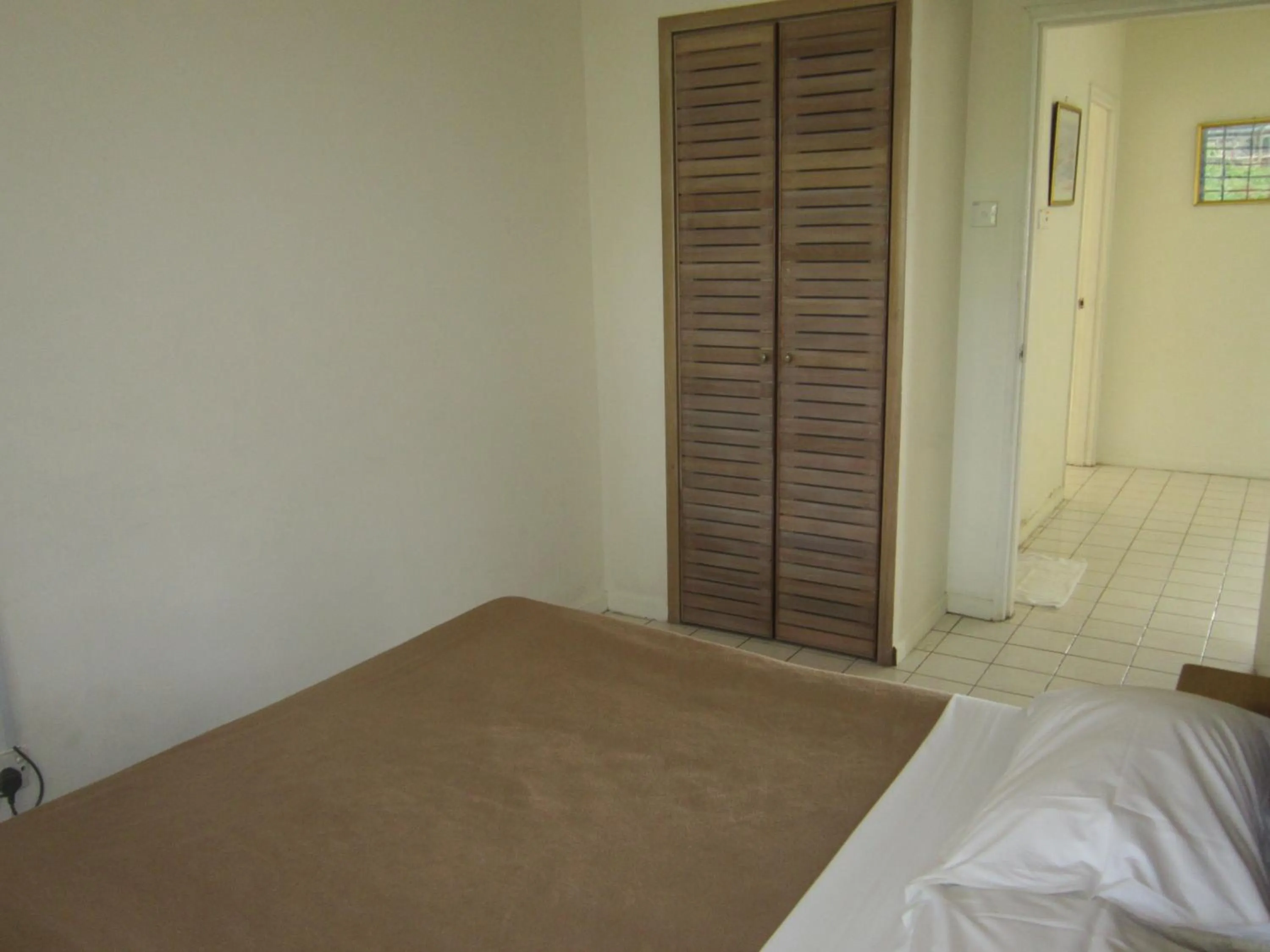 Bed in Paradise Lagoon Apartment