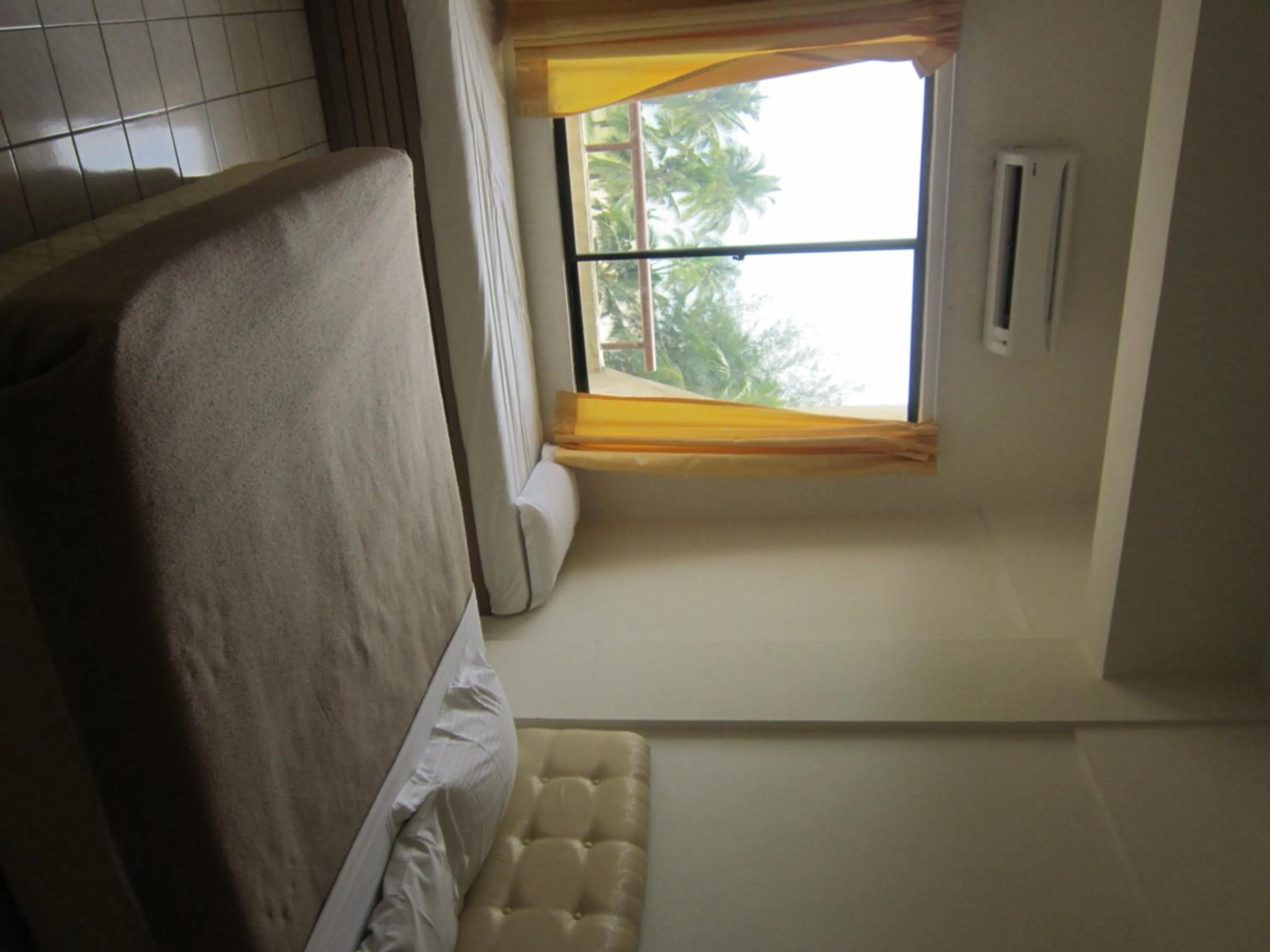 Bed in Paradise Lagoon Apartment