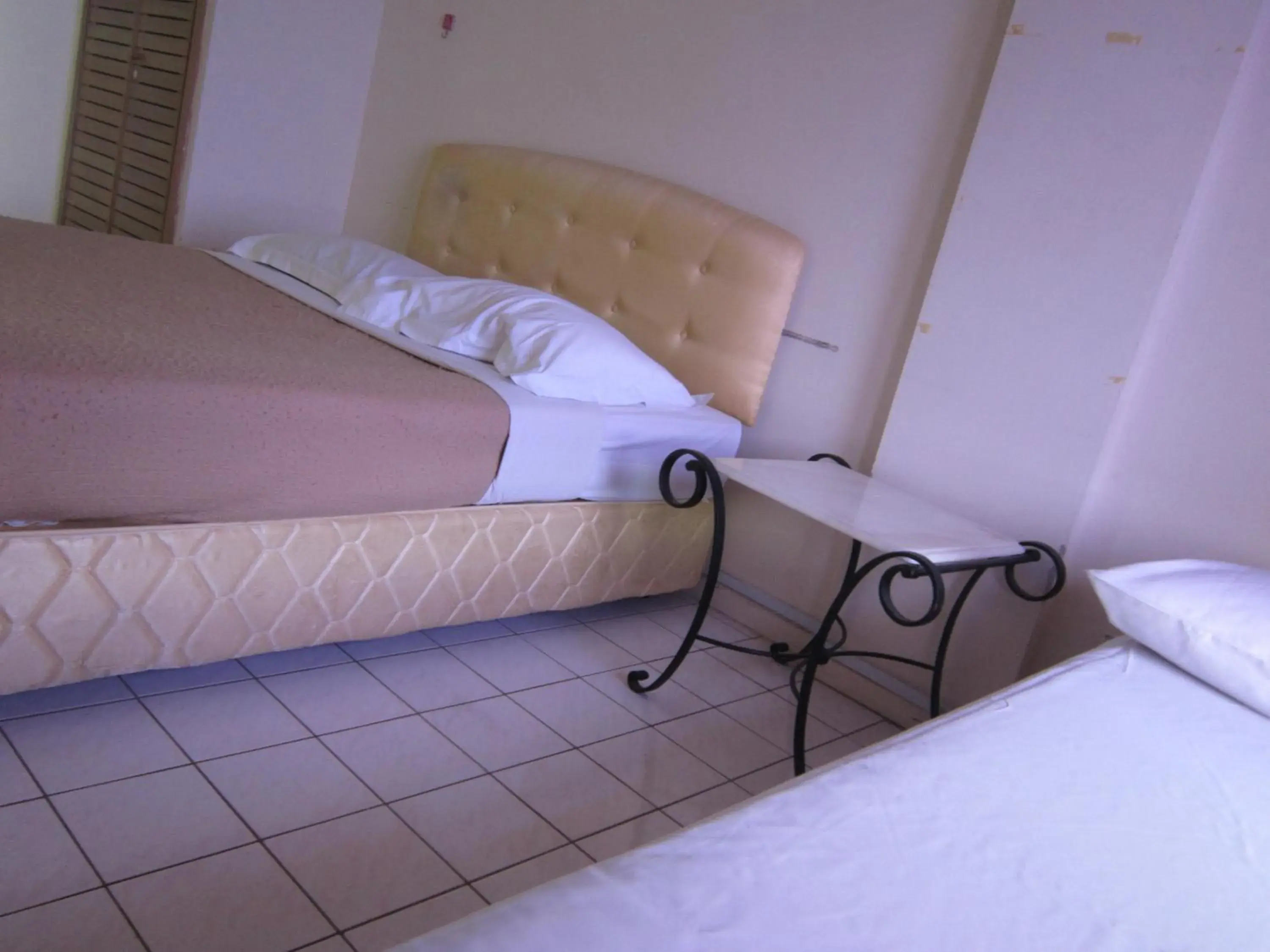 Bed in Paradise Lagoon Apartment Bed in Paradise Lagoon Apartment