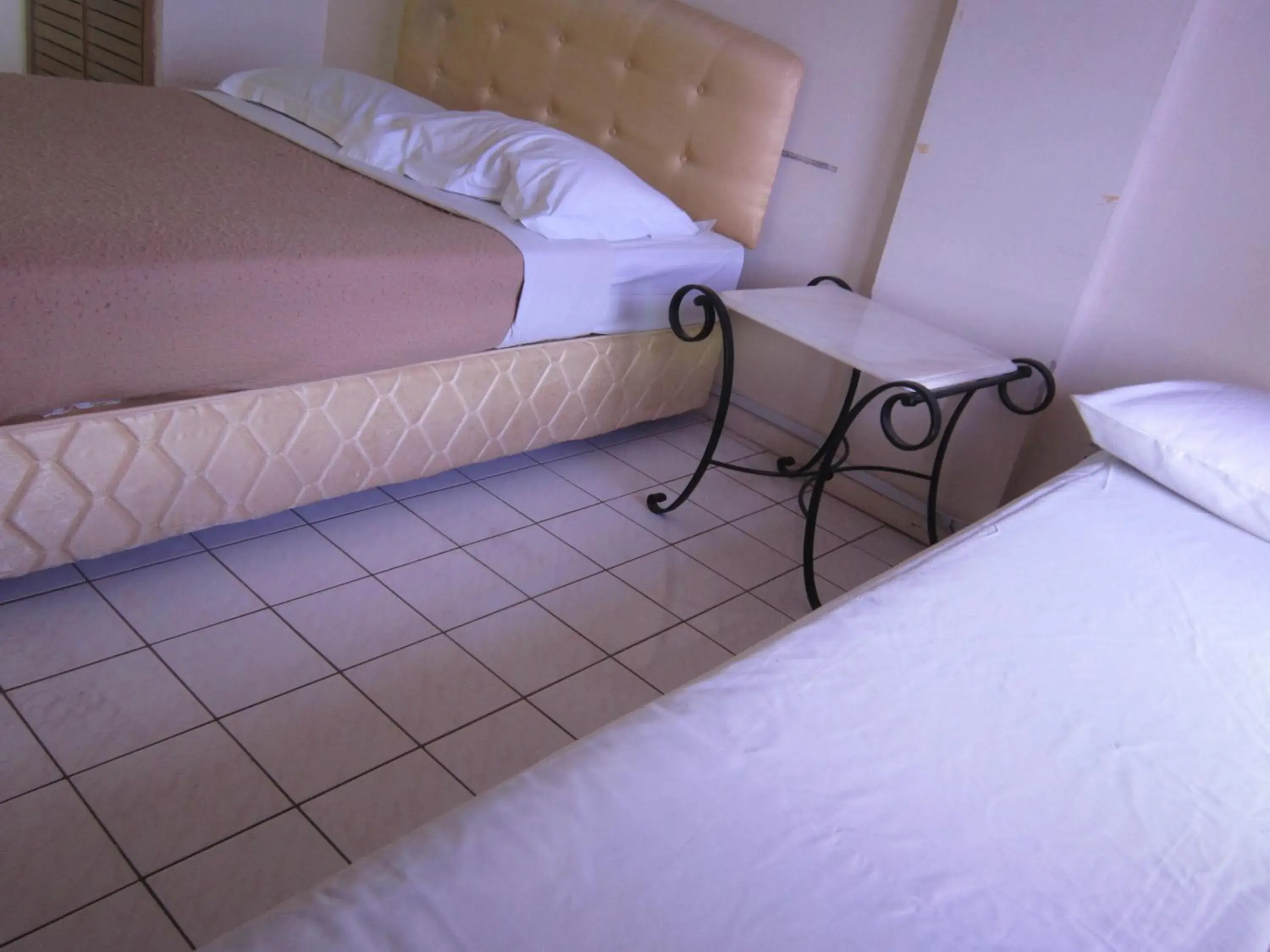 Bed in Paradise Lagoon Apartment Bed in Paradise Lagoon Apartment