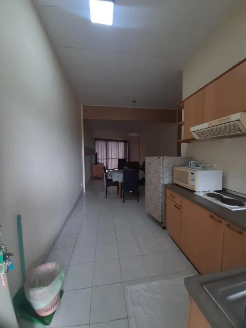 Kitchen or kitchenette in Seri Bulan Condo
