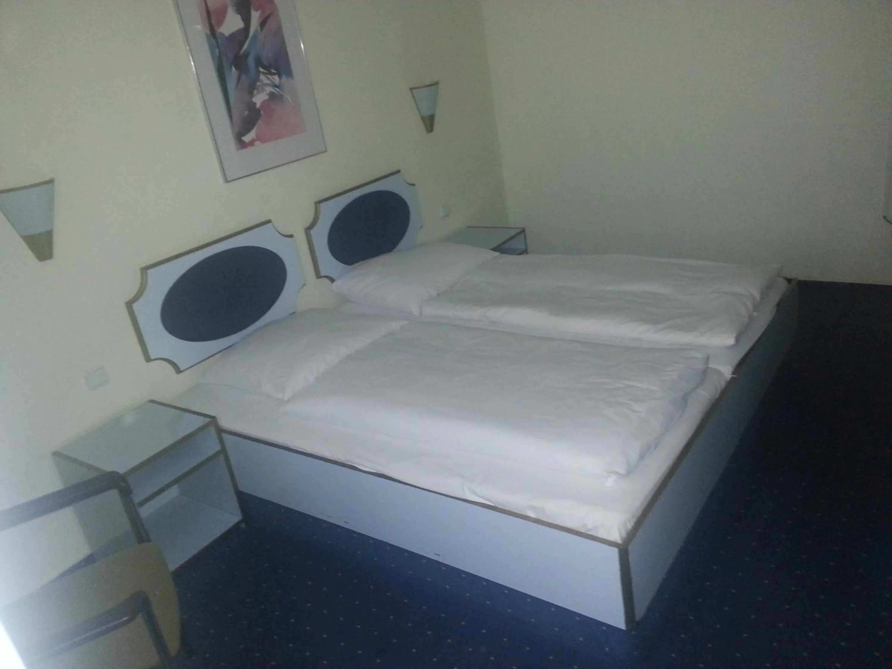 Bed in Hotelgarni Frankfurt