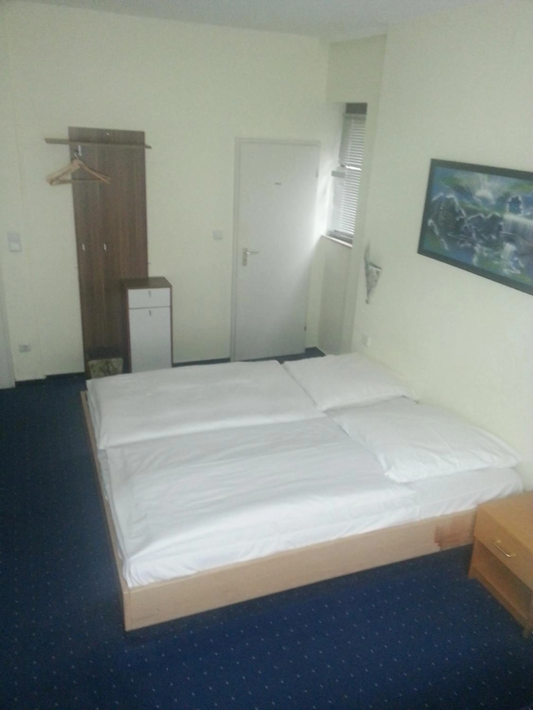 Bed in Hotelgarni Frankfurt