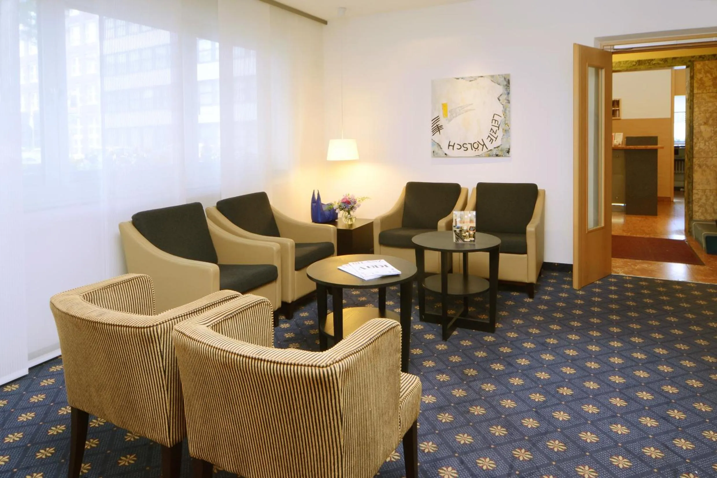 Communal lounge/ TV room in Hotel Ludwig Superior