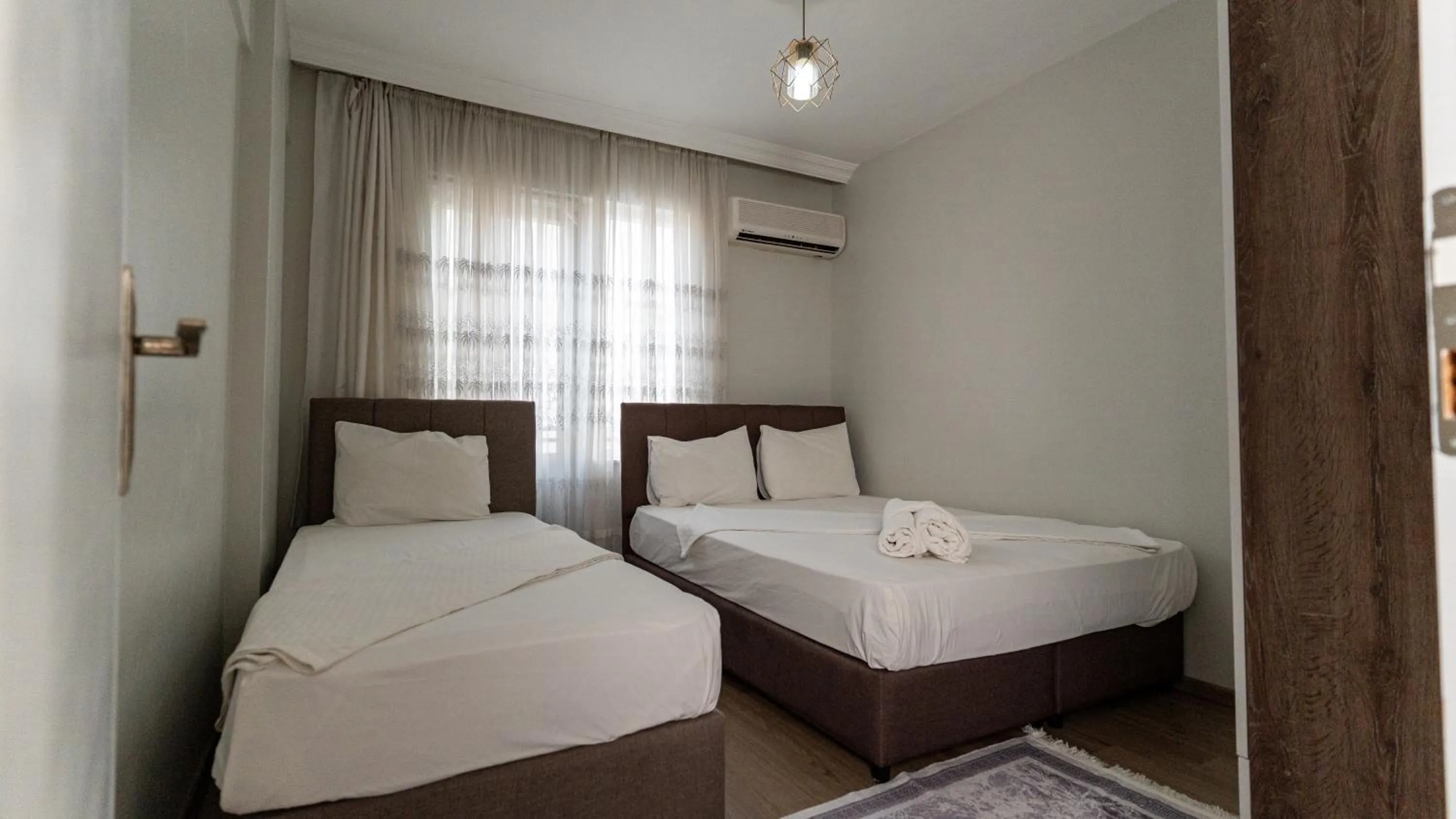 Bed in Yade Apart Pension