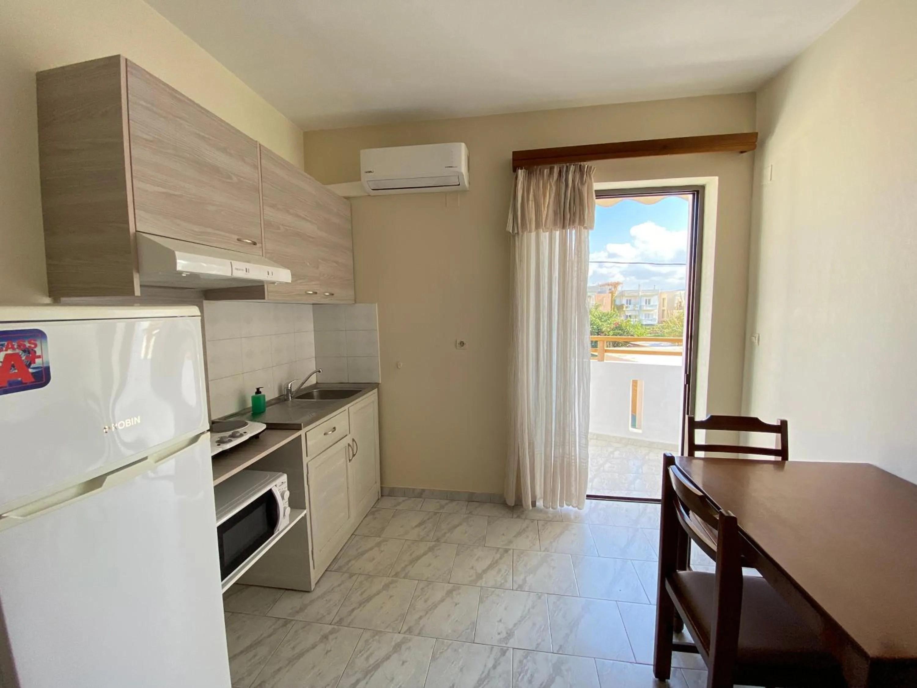 Kitchen or kitchenette in Domenica Apartments