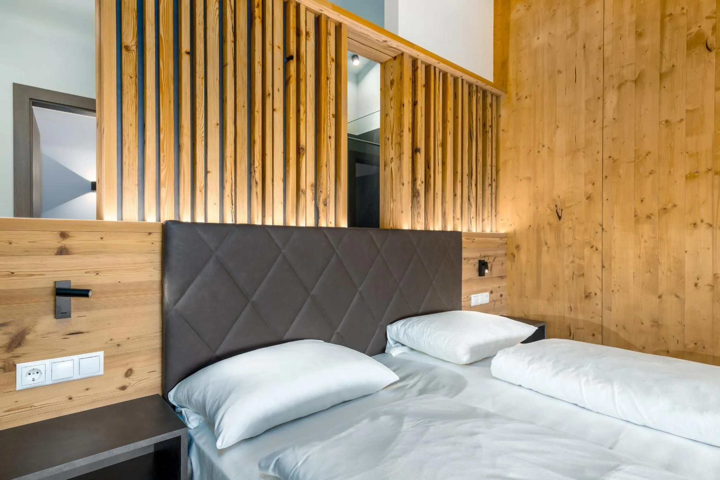 Bed in MONTARA living mountain air