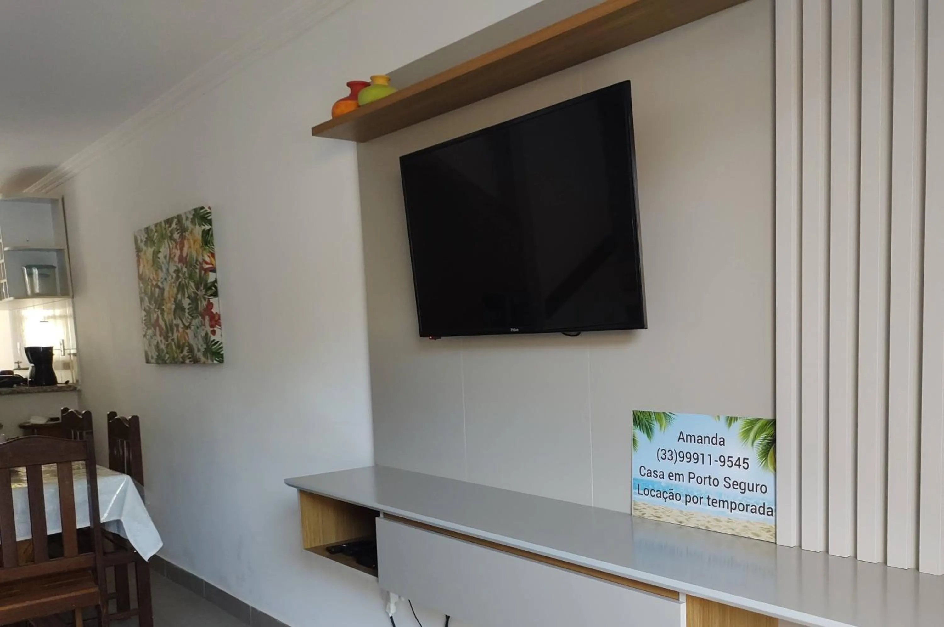 Communal lounge/ TV room in Casa Praia de Taperapuan em Porto