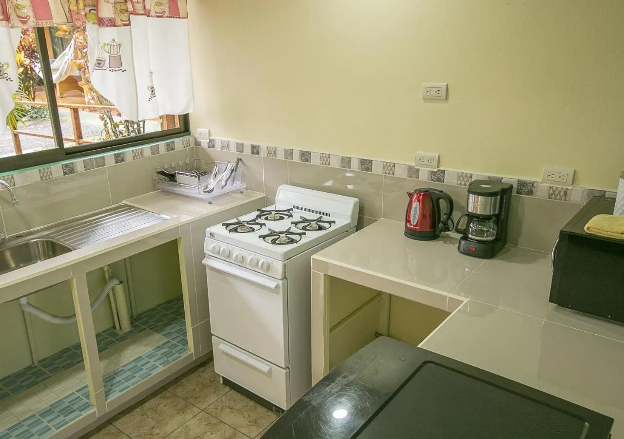 Kitchen or kitchenette in Cabañas Río Escondido en La Fortuna