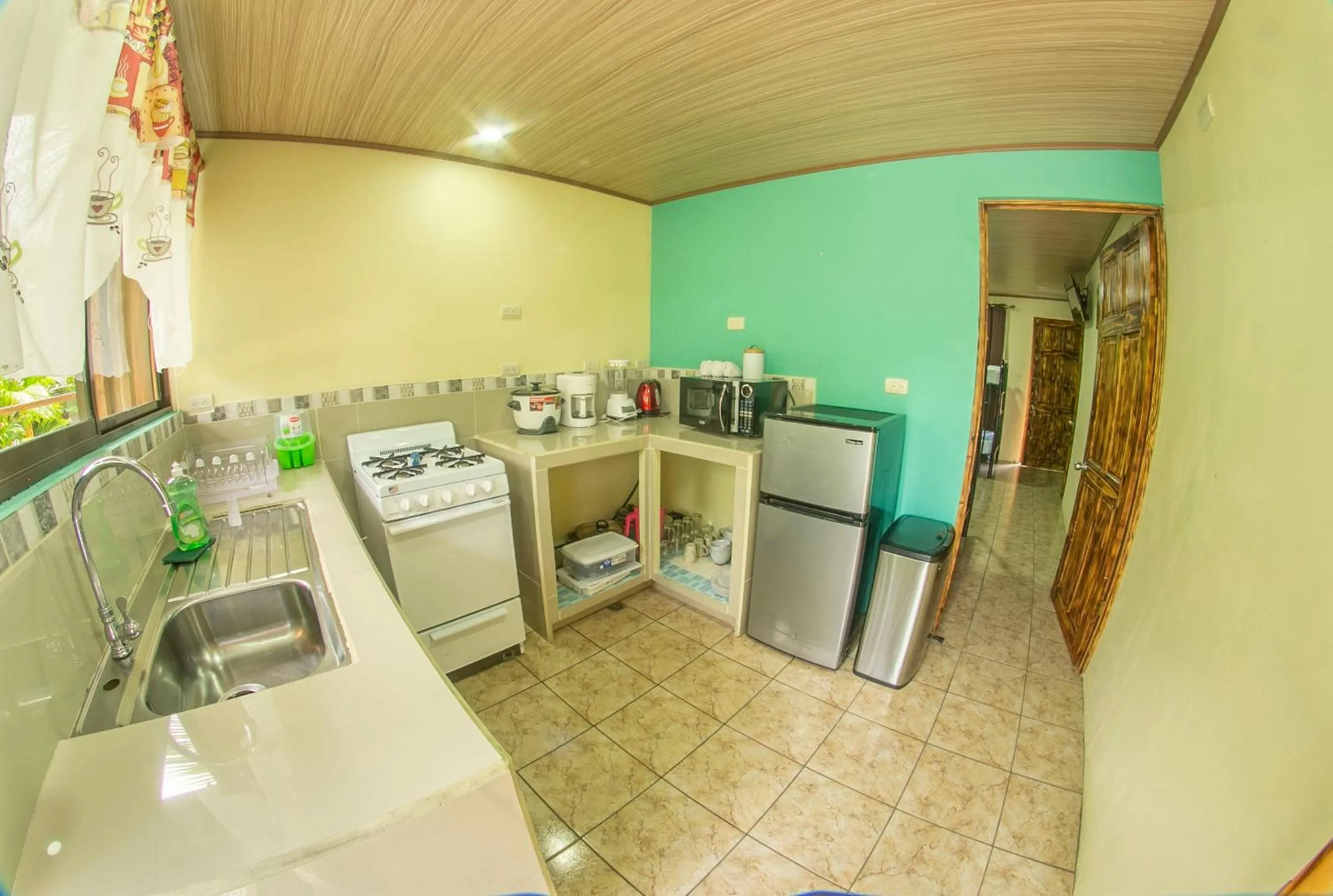 Kitchen or kitchenette in Cabañas Río Escondido en La Fortuna