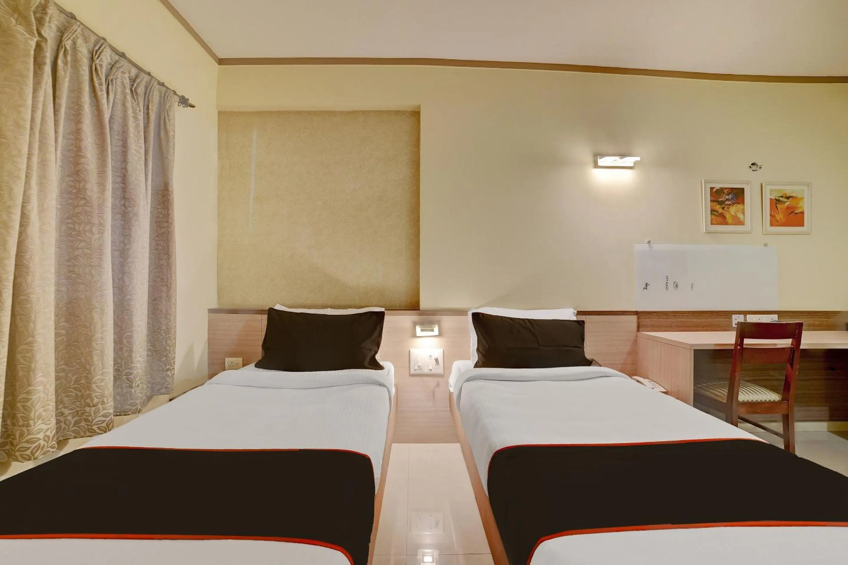 Bedroom, Bed in Townhouse Oak Pune Railway Station Formerly Kapil Residency